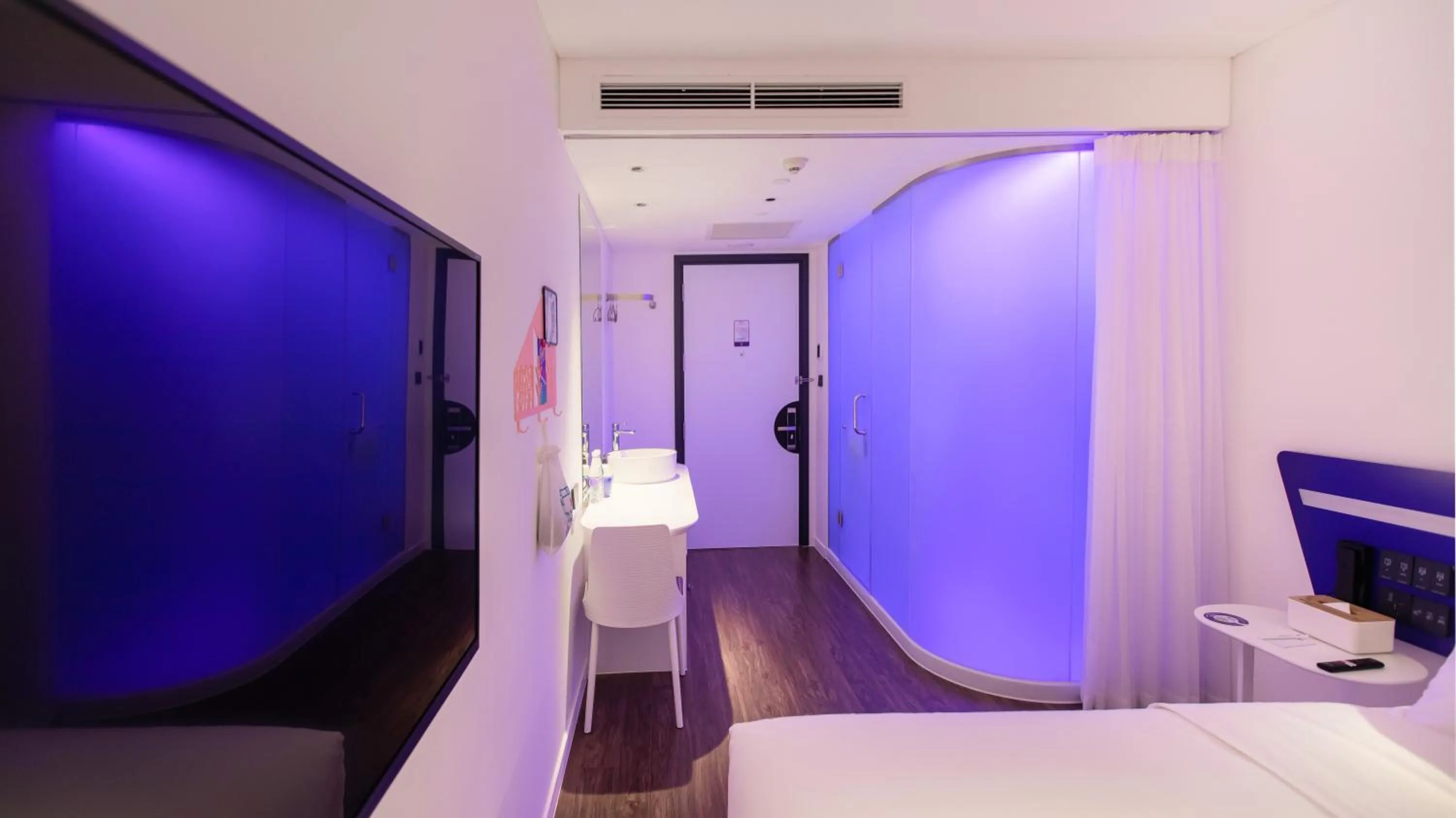 Photo of the whole room, Bed in SOJO Hotel Lao Cai