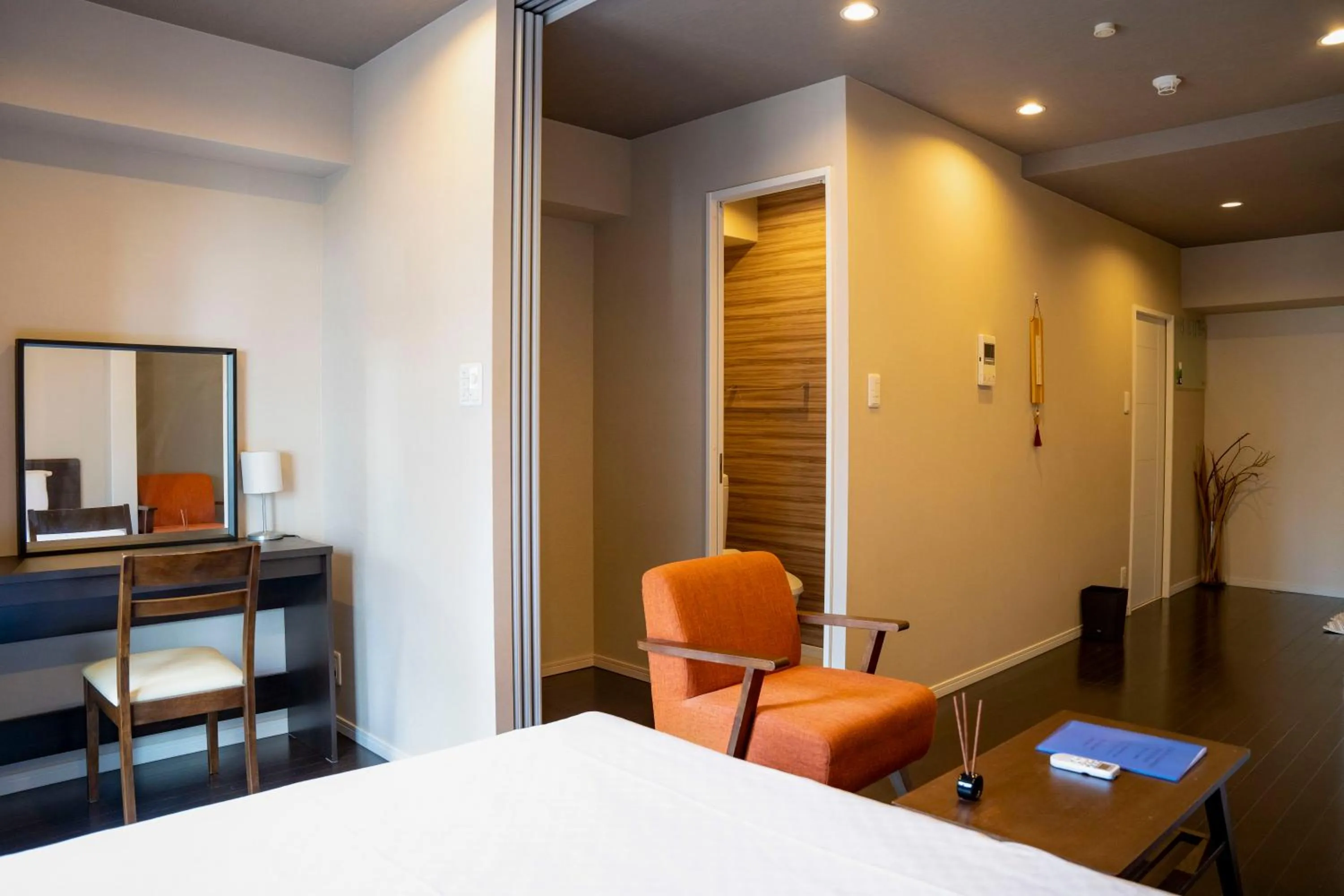 Living room, Bed in Sakimoto Residence Namba Minami