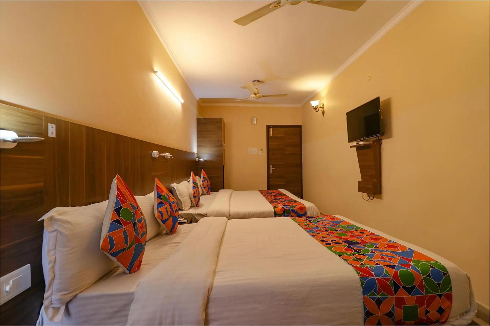 Communal lounge/ TV room, Bed in FabHotel GD Sunrise Inn Amritsar