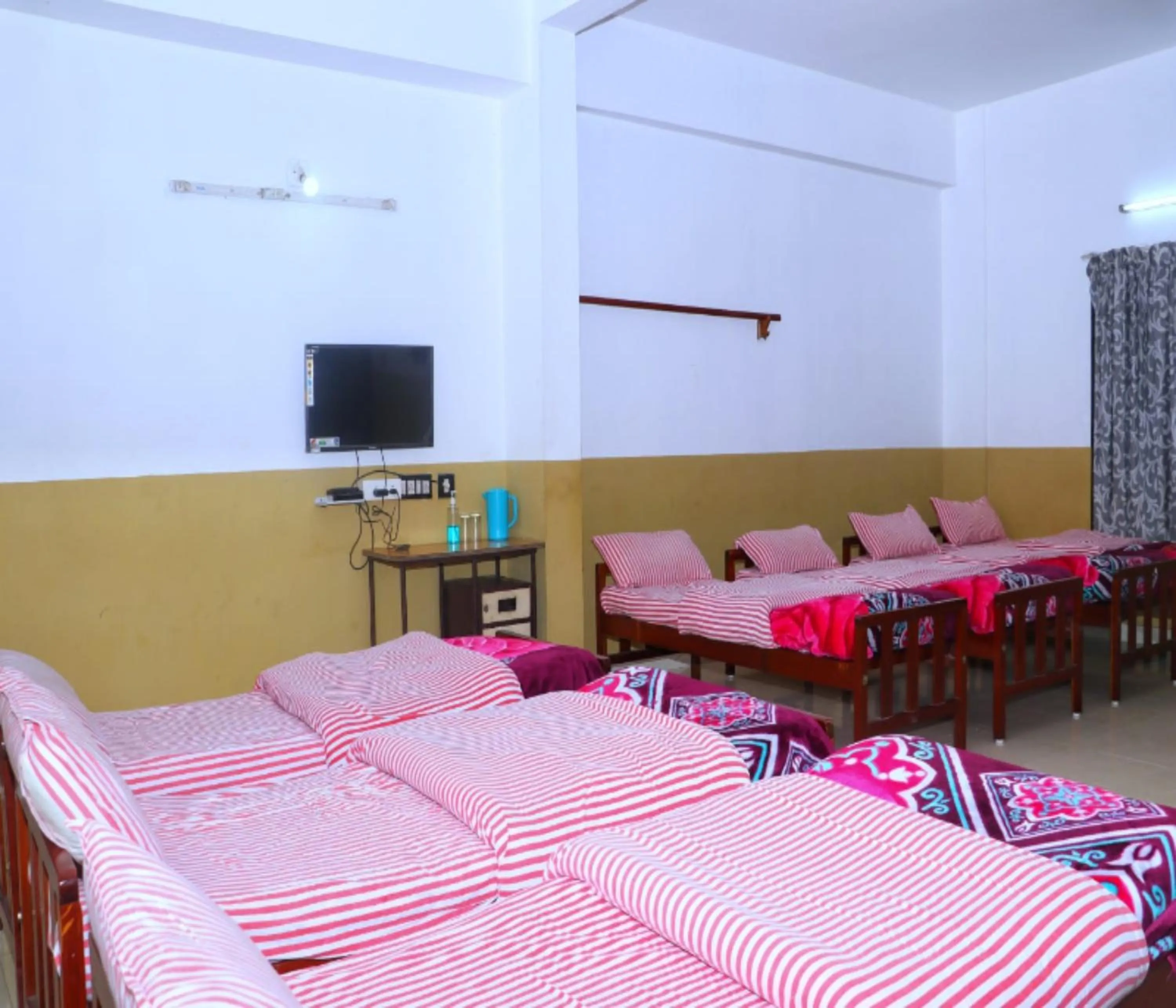 Photo of the whole room, Bed in AC MIST