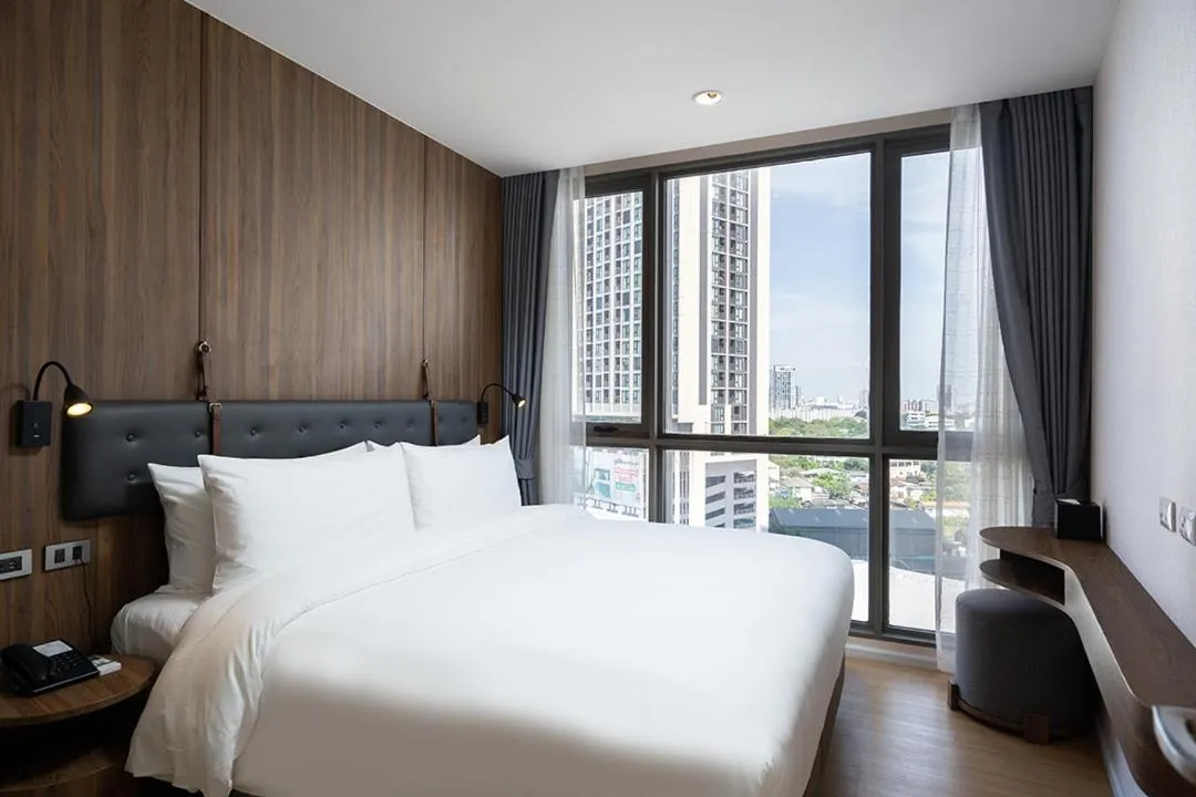 Bed in Oakwood Suites Tiwanon Bangkok