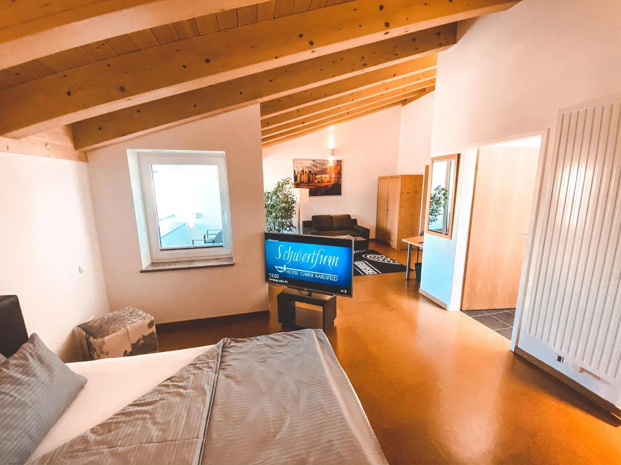 Living room, Bed in Hotel Schwertfirm