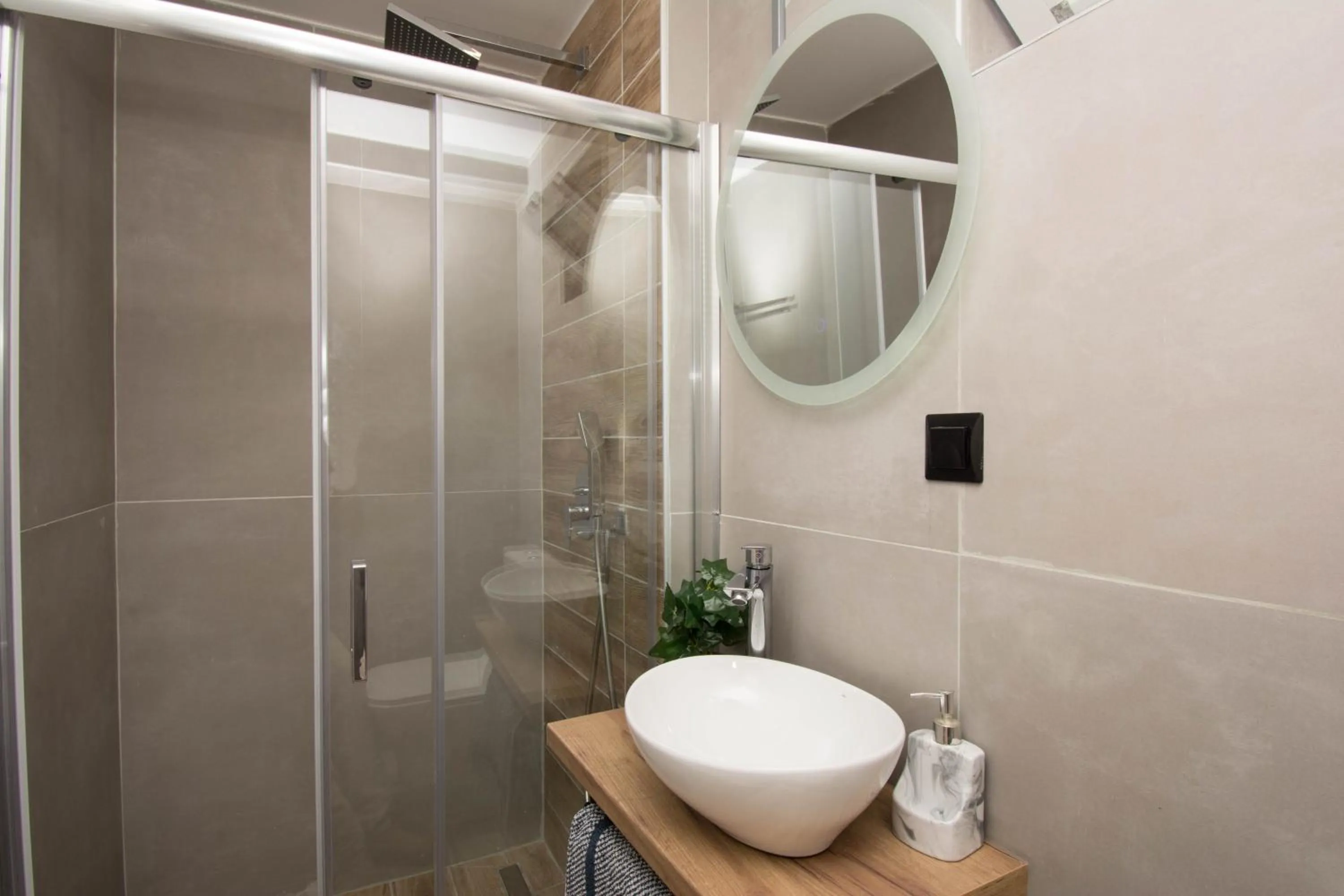 Bathroom in Jasmine Suites "By Checkin"