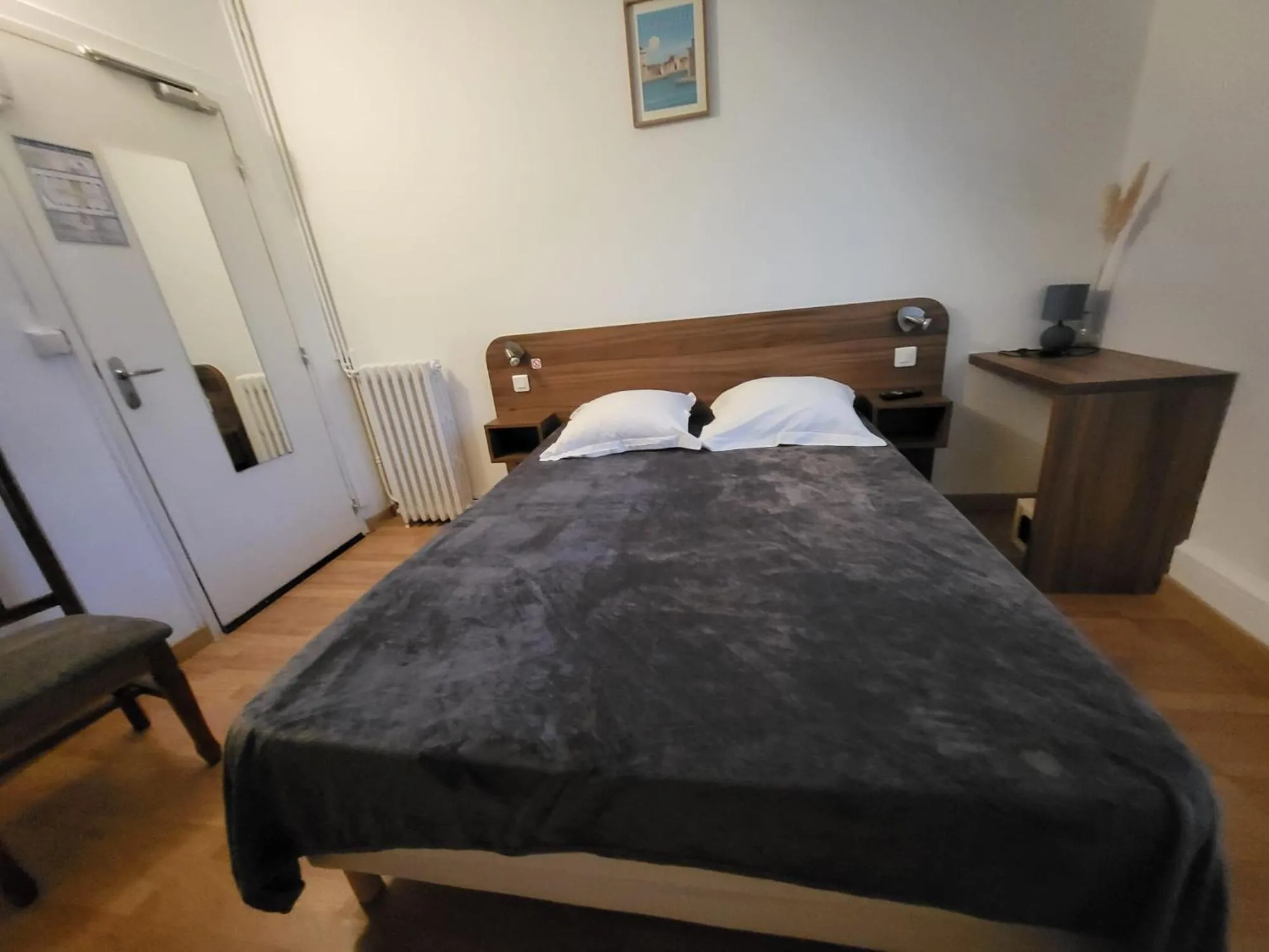 Bedroom in Hotel Les Rosiers