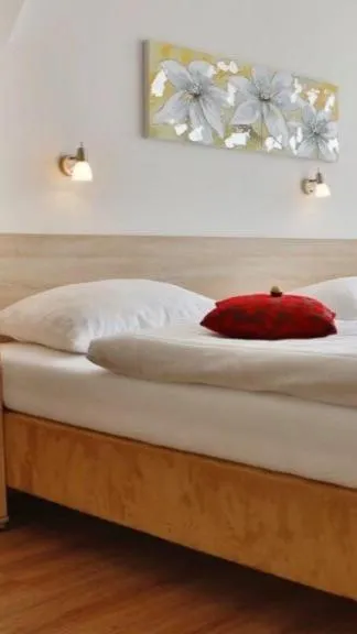 Bed in Das Falk Apartmenthaus