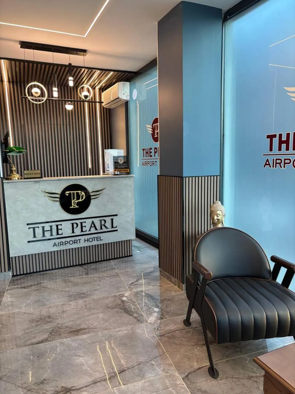 Lobby or reception in The Pearl Airport Hotel