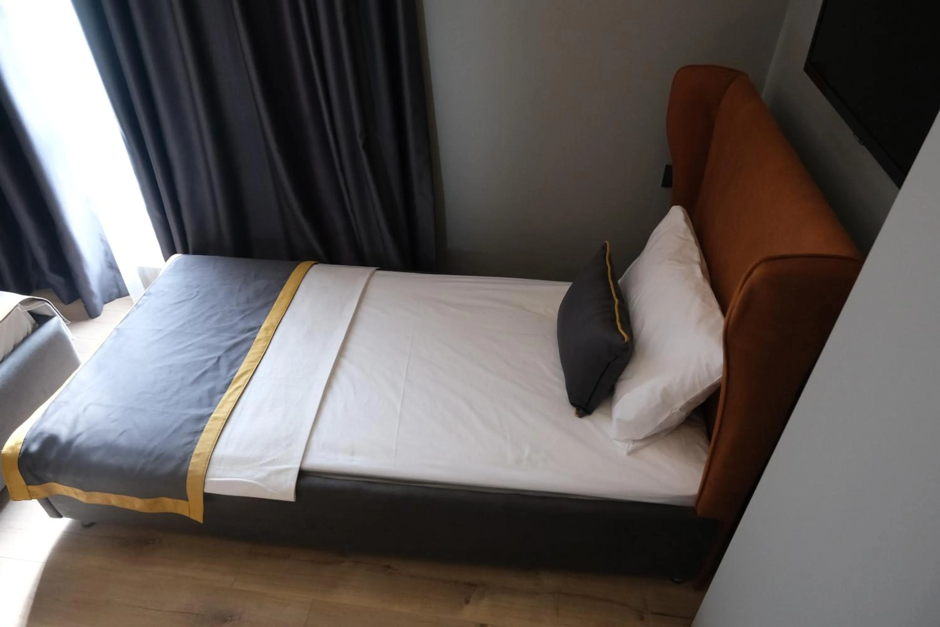 Bed in The Pearl Airport Hotel