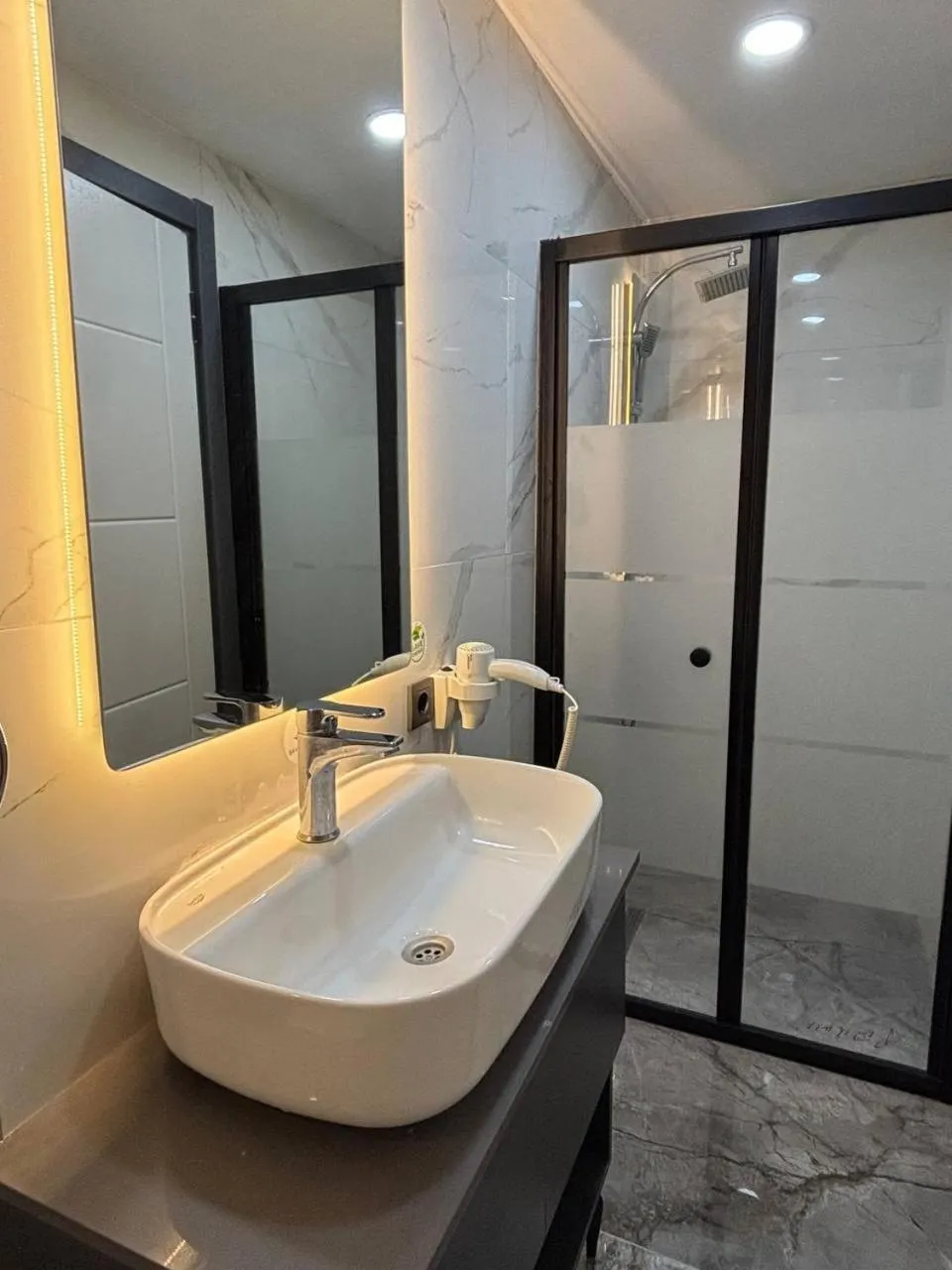 Shower in The Pearl Airport Hotel