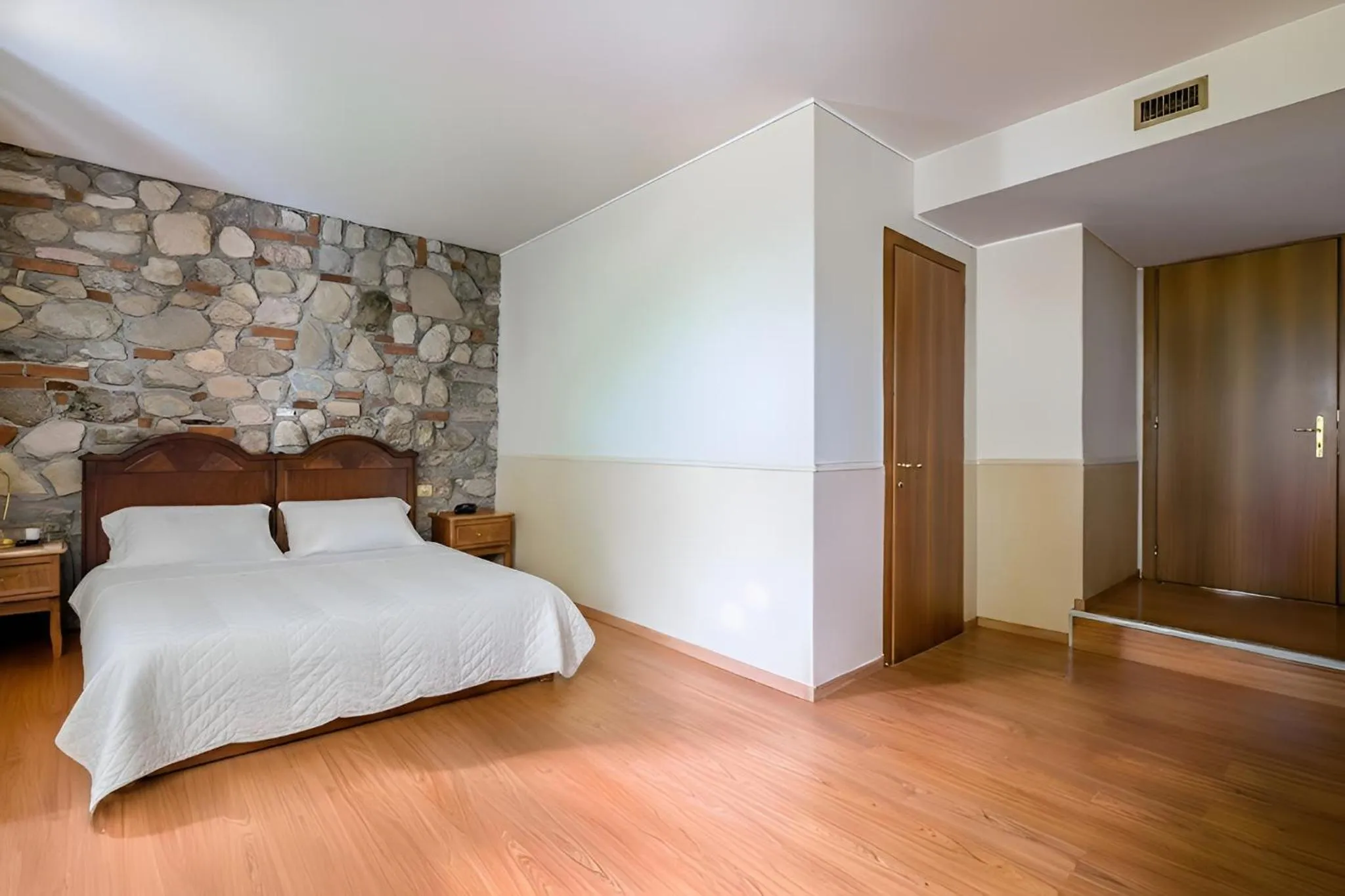 Bedroom, Bed in AHG Golf Hotel Porta Del Sole