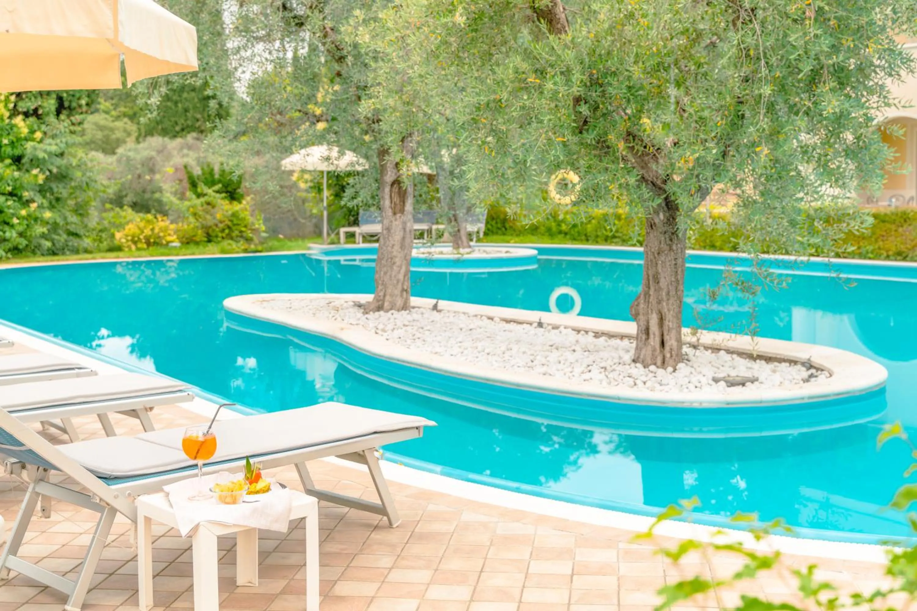 Swimming pool in AHG Golf Hotel Porta Del Sole