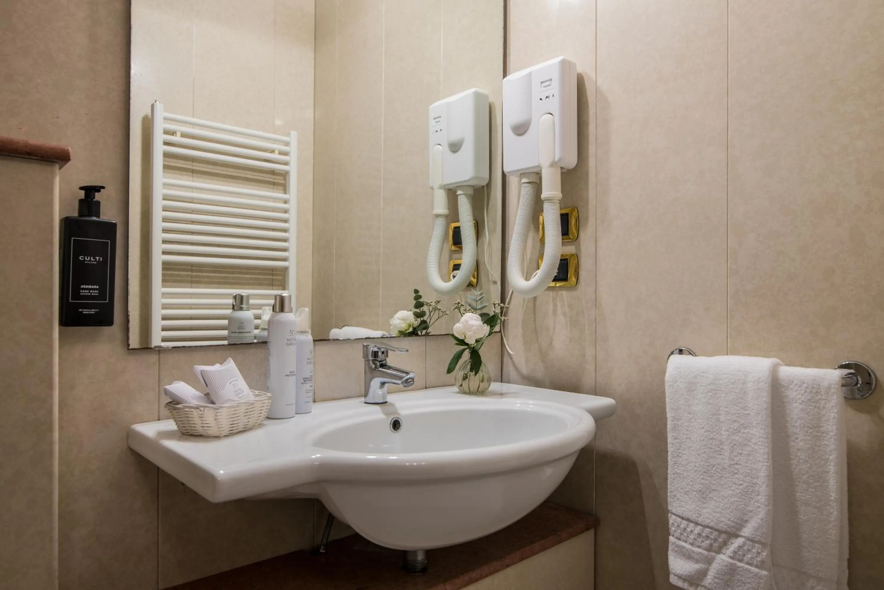 Bathroom in AHG Golf Hotel Porta Del Sole