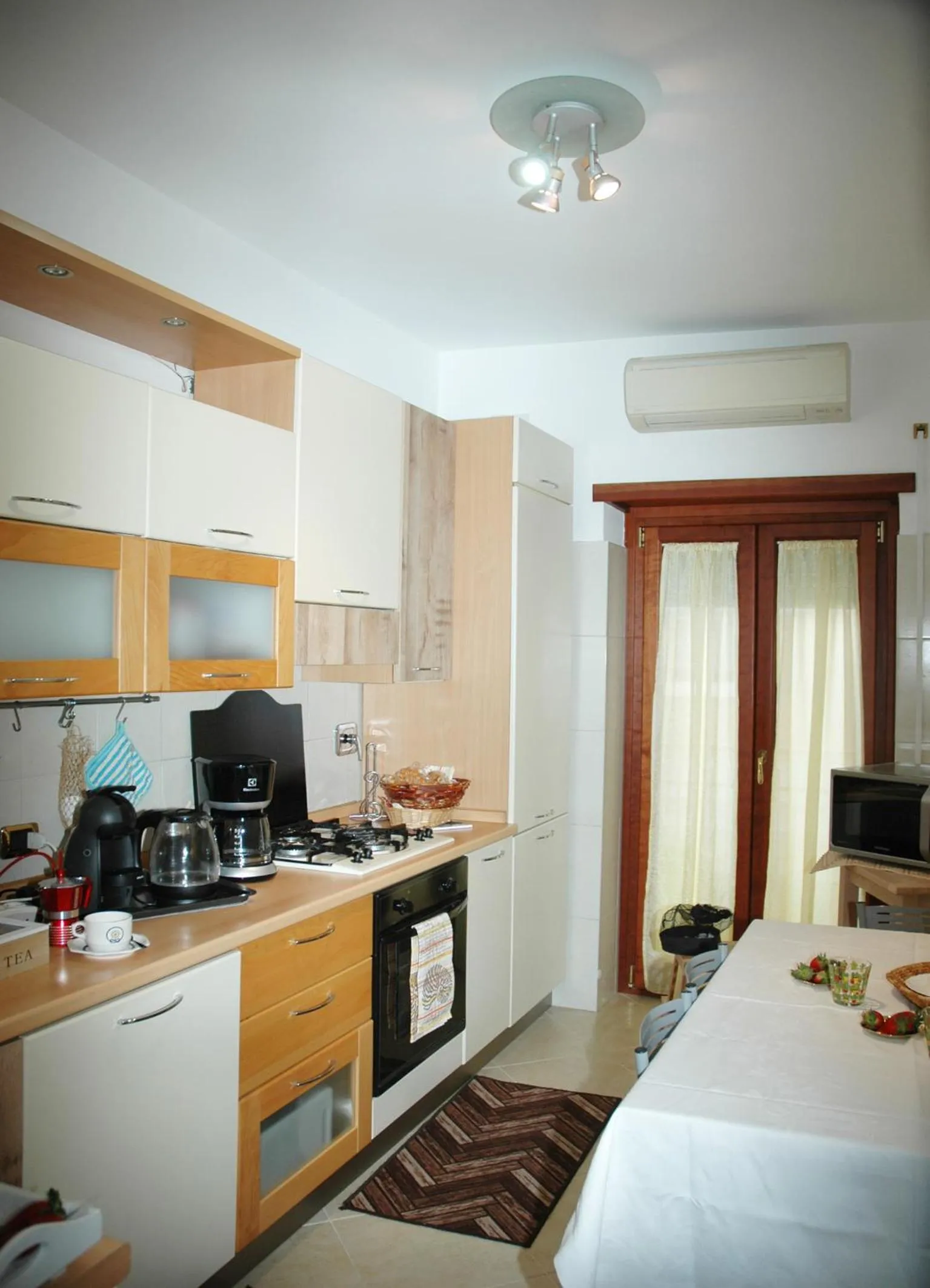 Kitchen or kitchenette, Bed in La Dimora di Livia