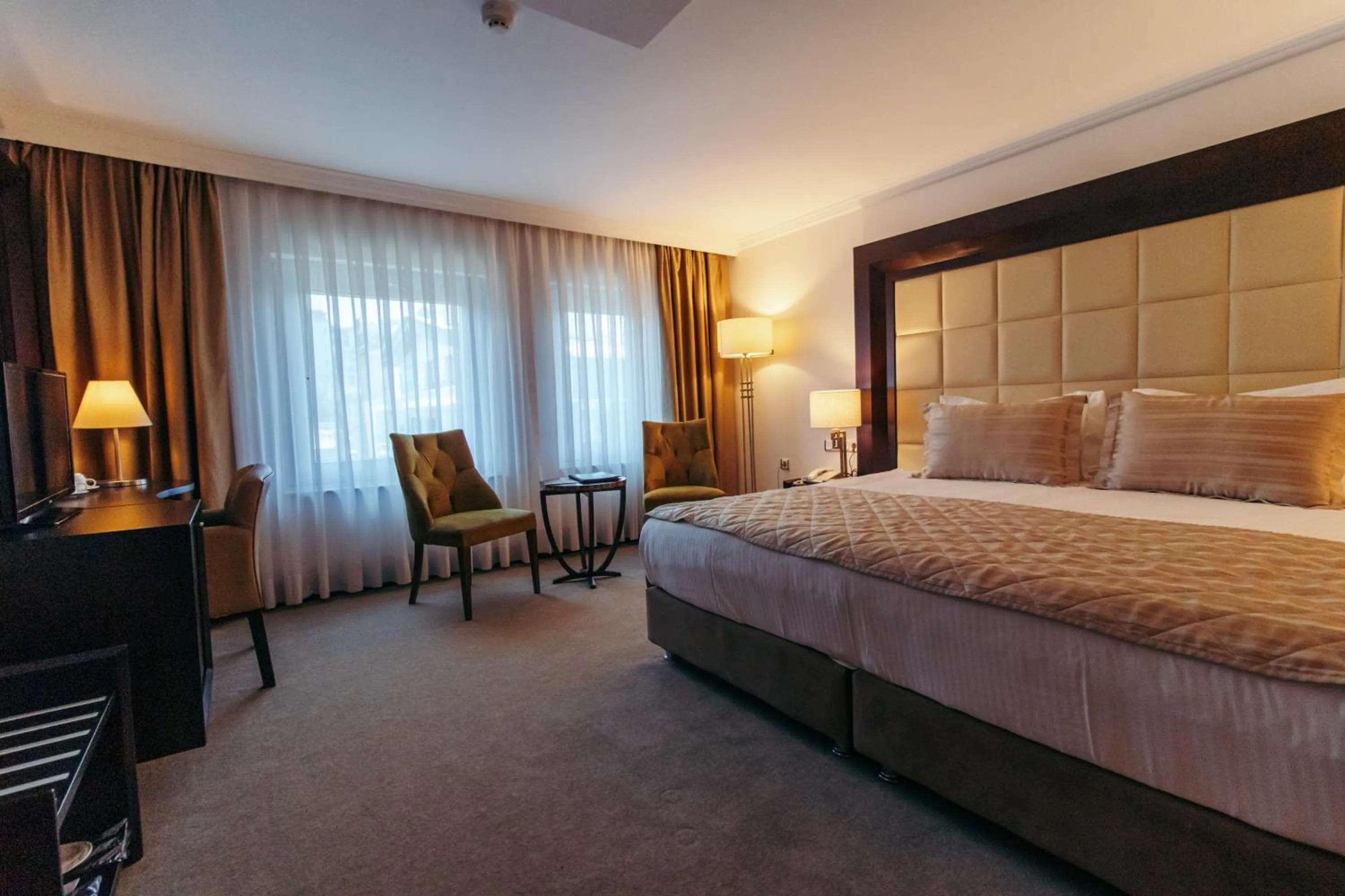 Photo of the whole room, Bed in CK Farabi Hotel