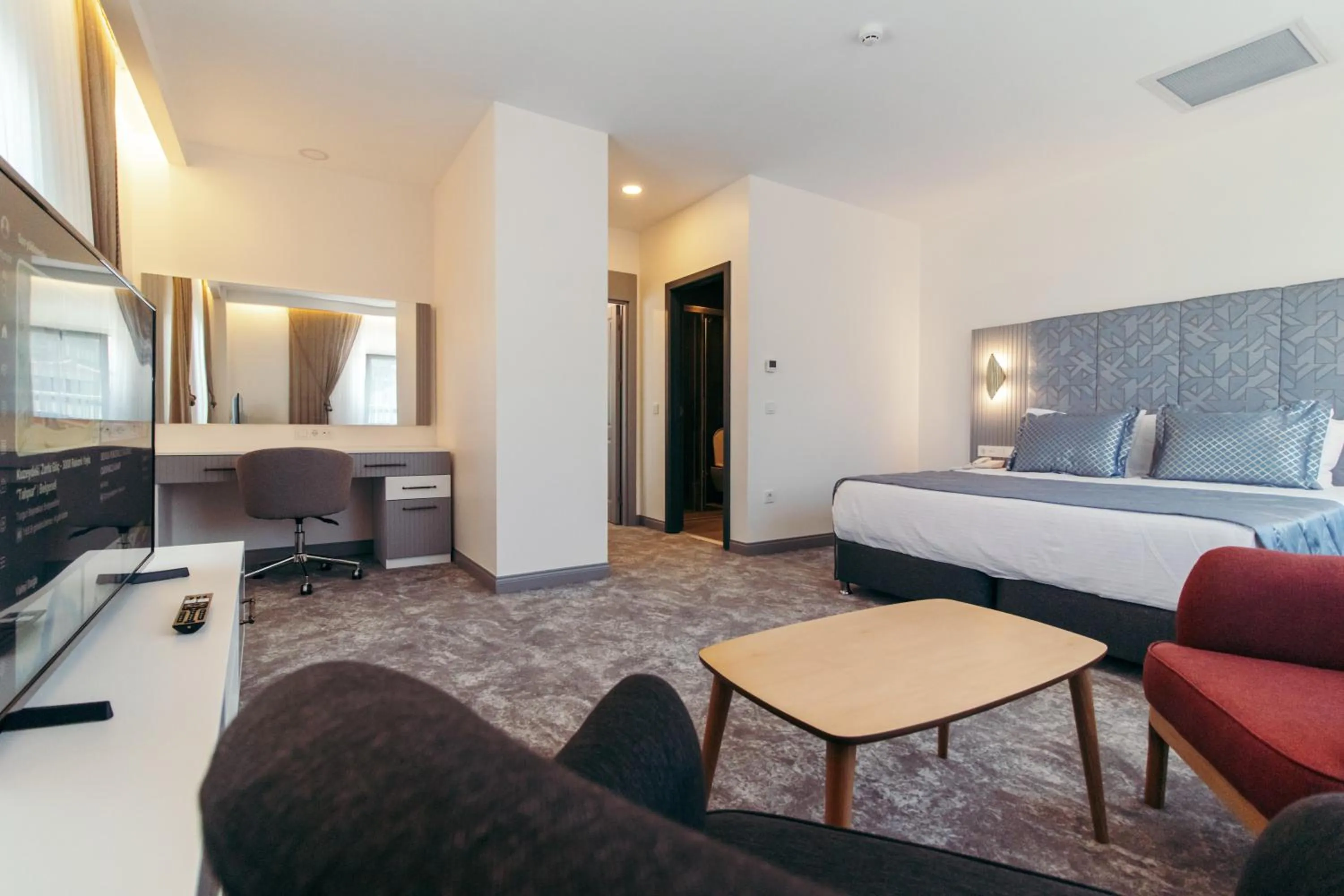 Bed in CK Farabi Hotel