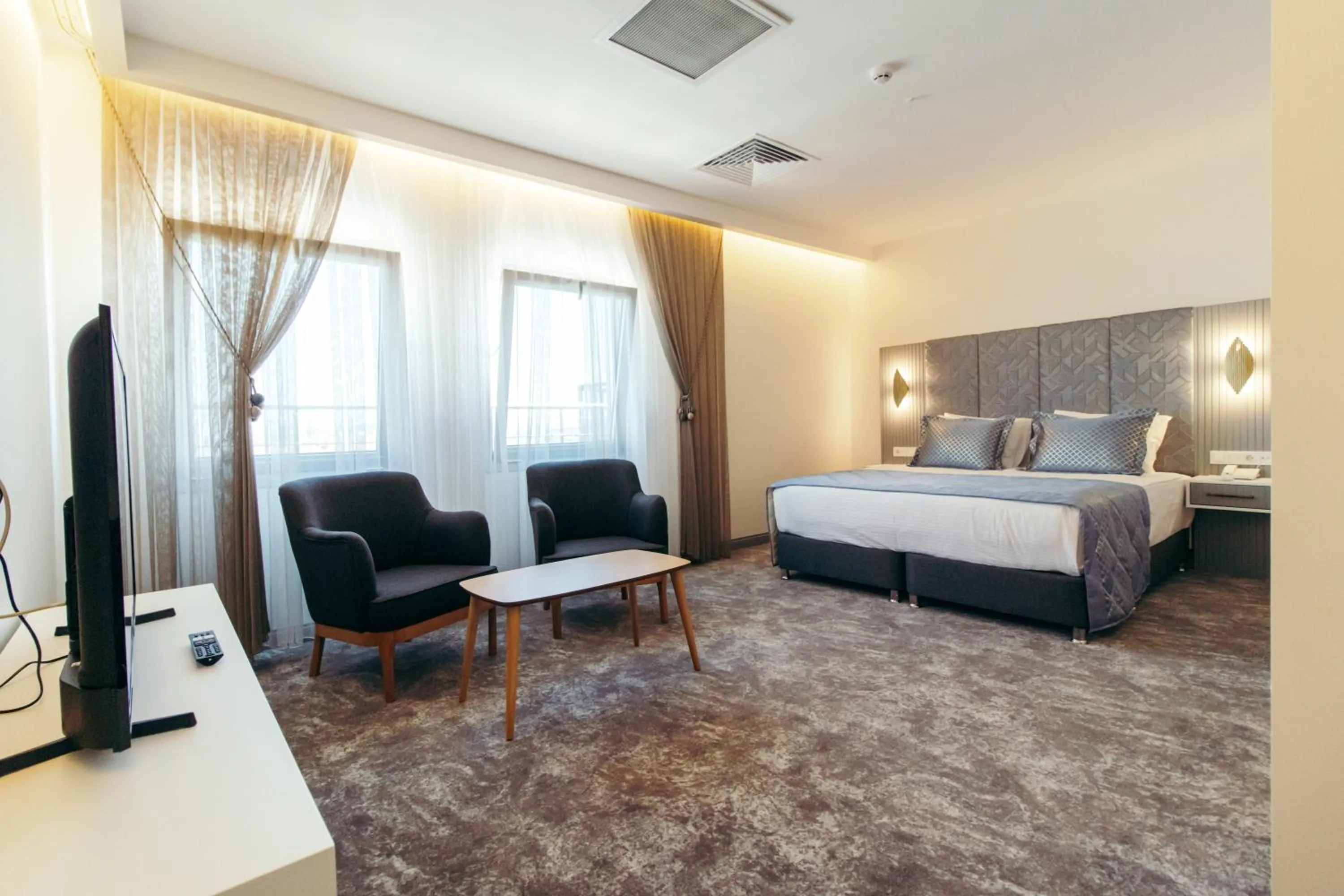 Photo of the whole room, Bed in CK Farabi Hotel