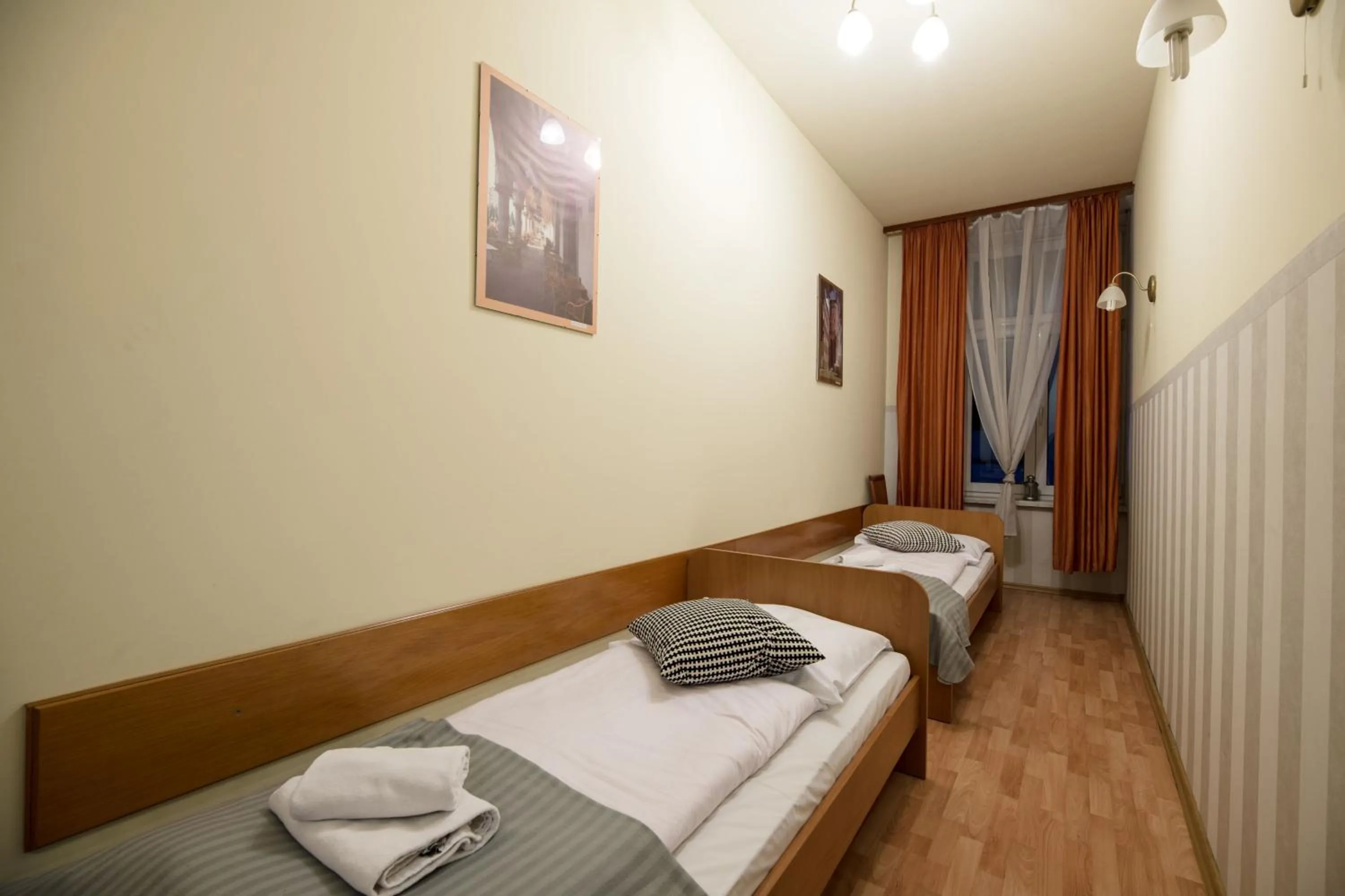 Photo of the whole room, Bed in Golden Lion Guest Rooms Szewska 19