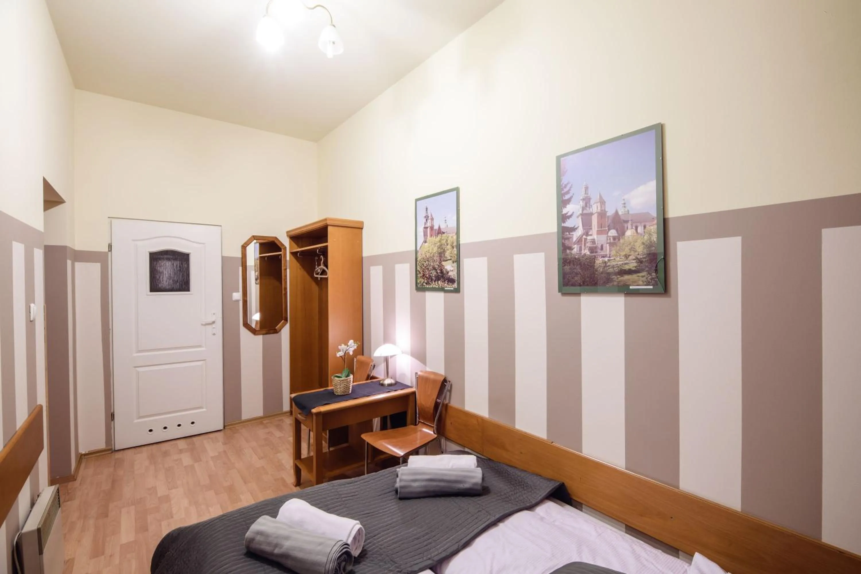 Photo of the whole room, Bed in Golden Lion Guest Rooms Szewska 19