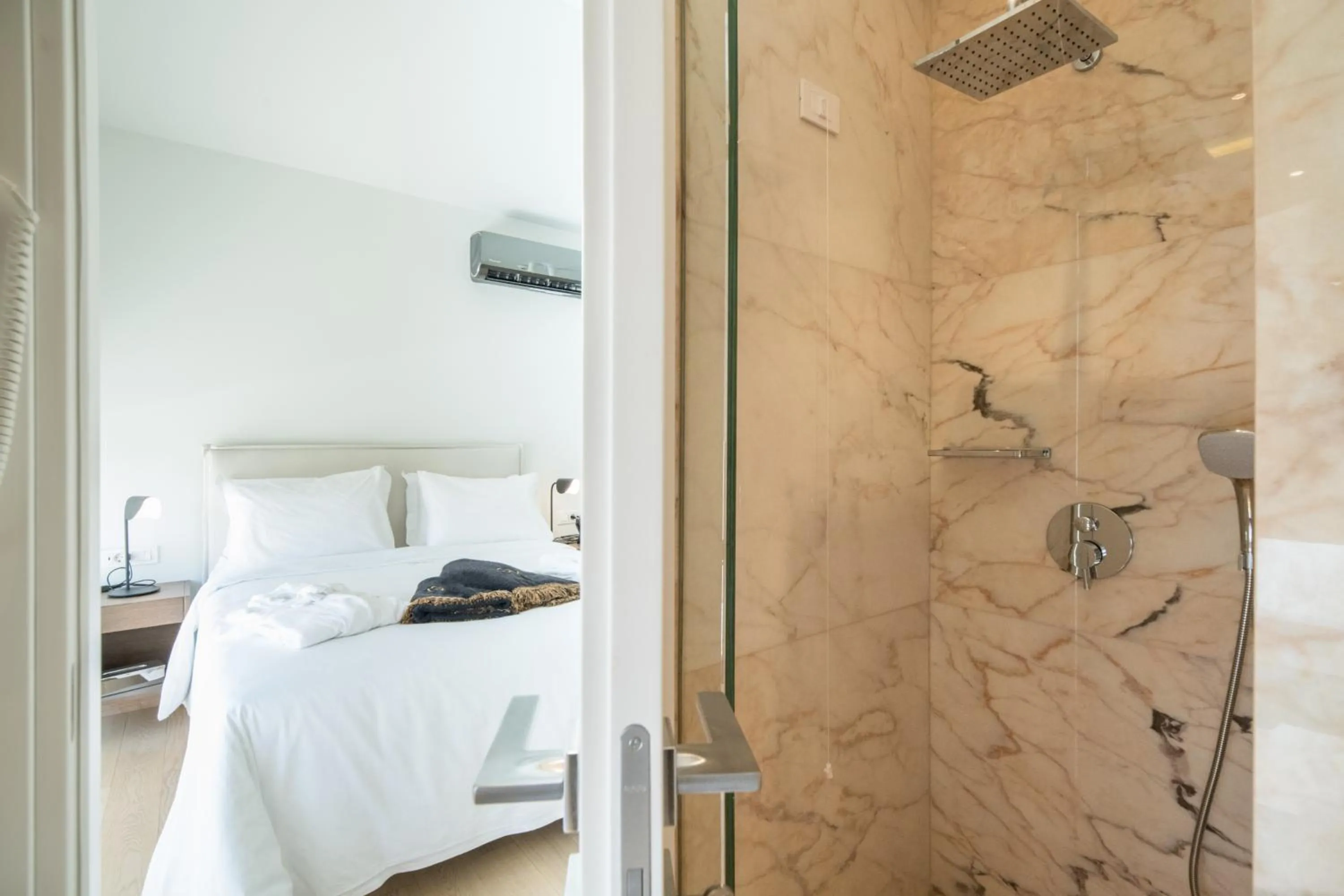 Bed in GM exclusive Luxury Suites & SPA