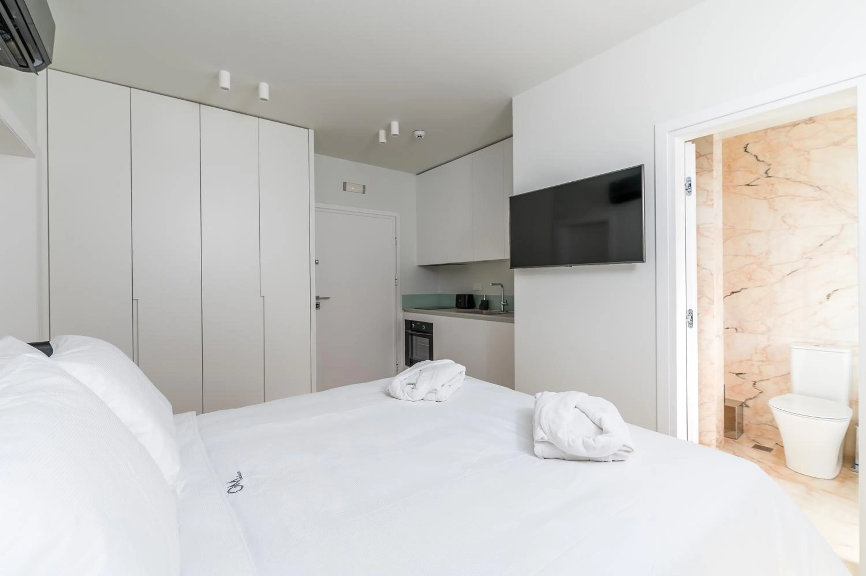 Bed in GM exclusive Luxury Suites & SPA