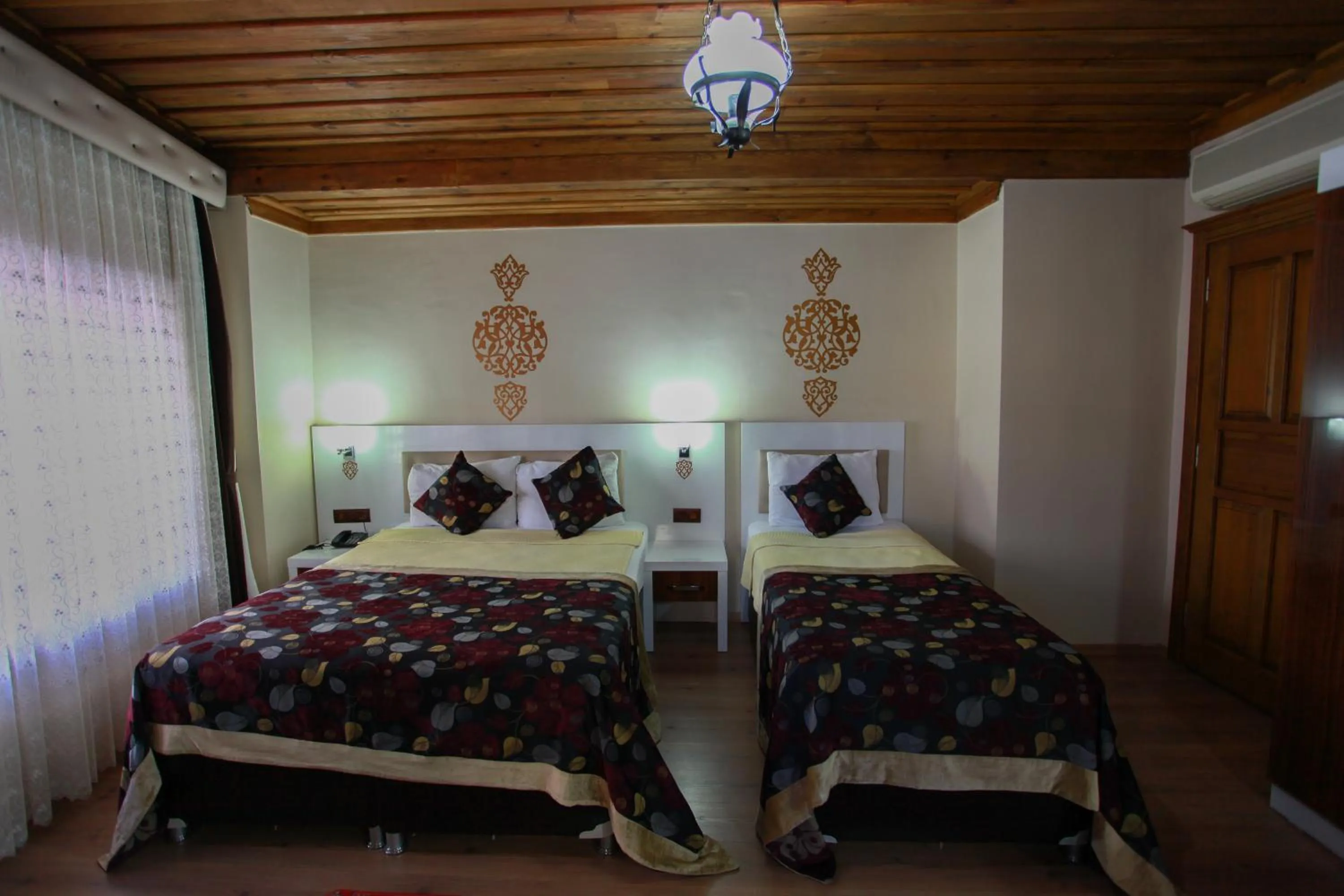 Decorative detail, Bed in Bacchus Pension