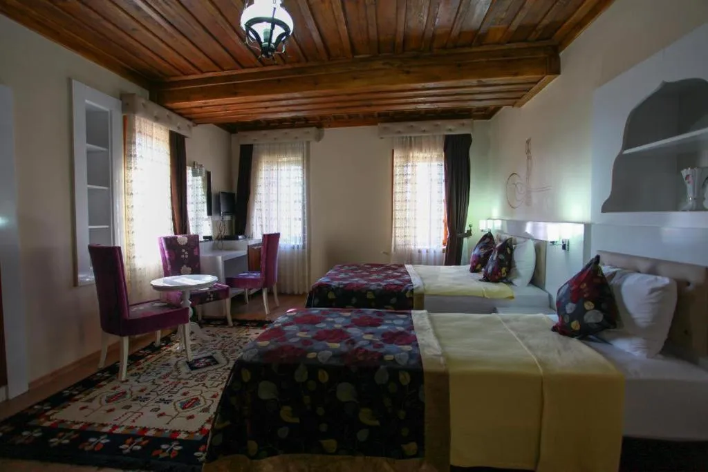 Bed in Bacchus Pension