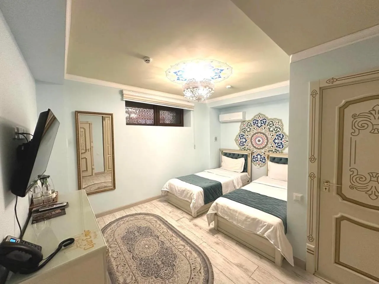 Bed in Gur Emir Palace boutique hotel