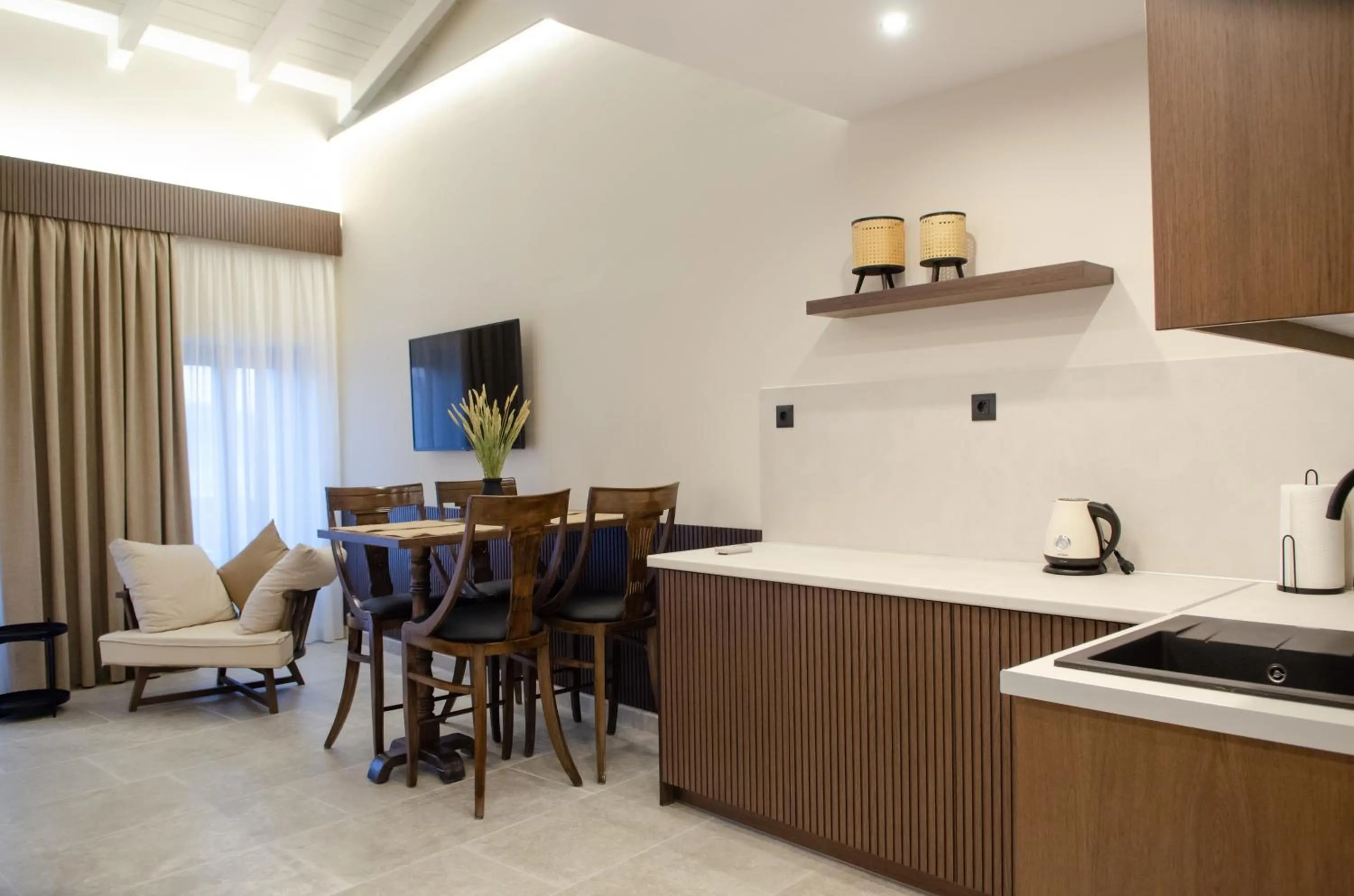 Kitchen or kitchenette in Leone suites