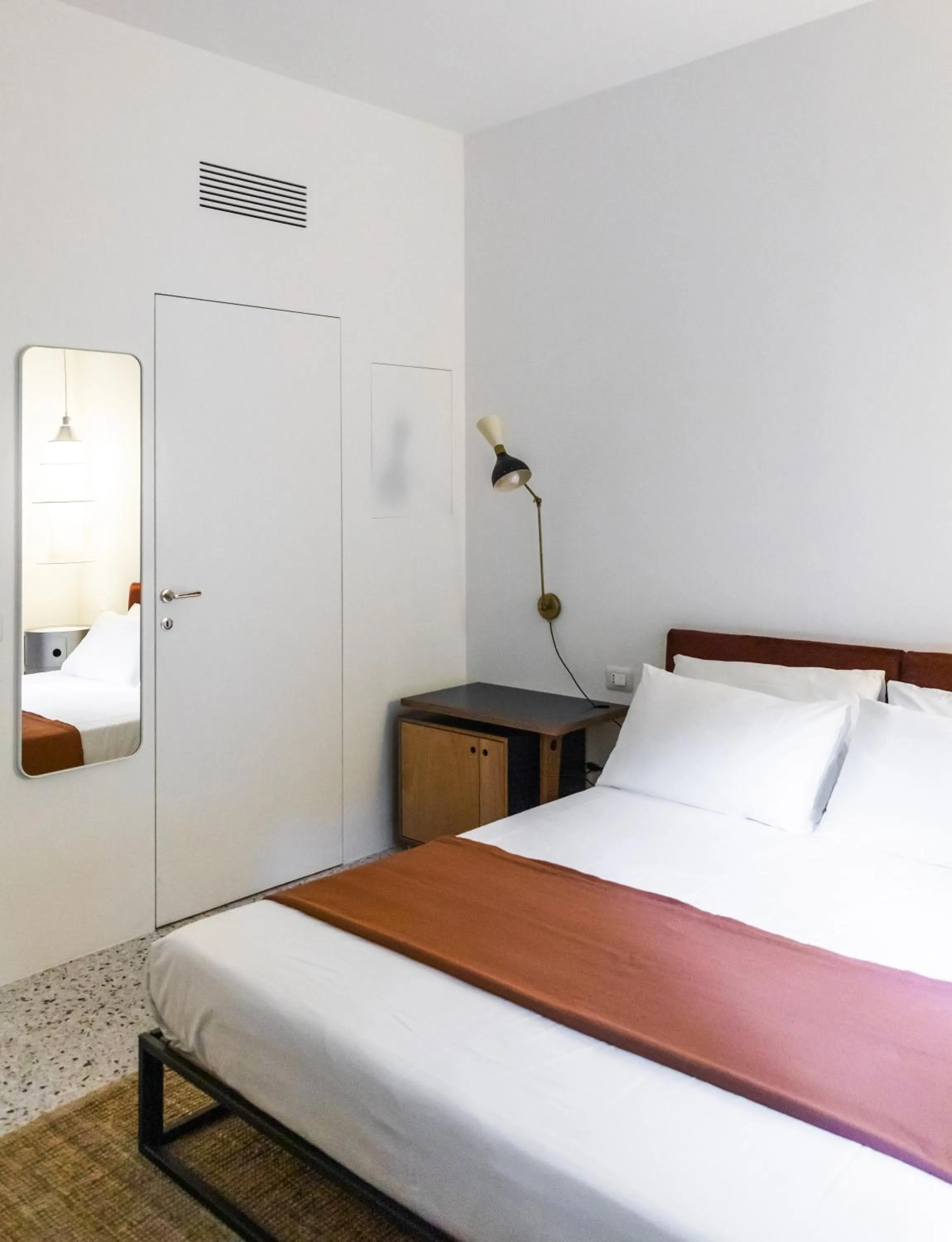 Bed in Hotel Dolomiti