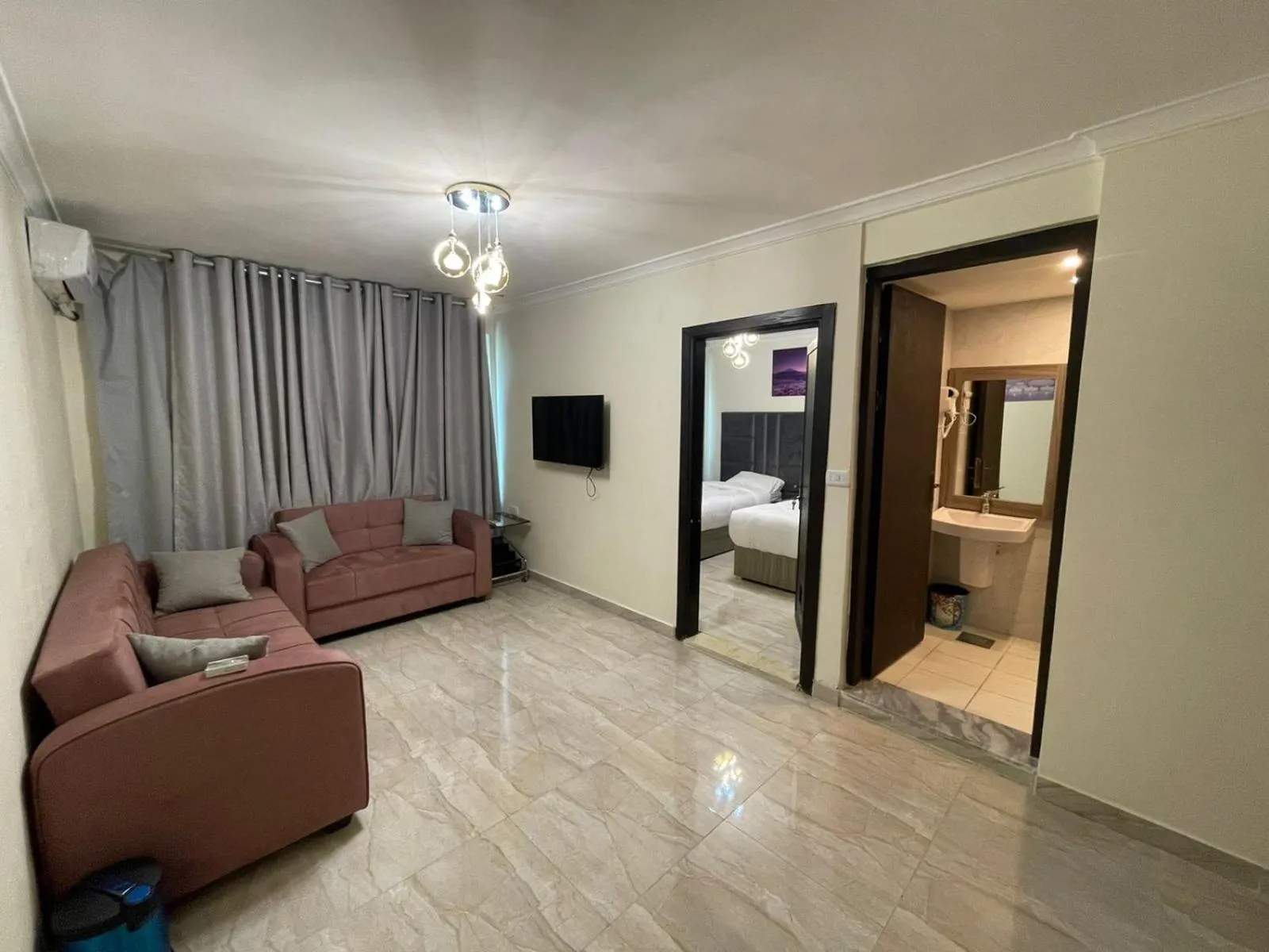 Communal lounge/ TV room in Golden Hotel