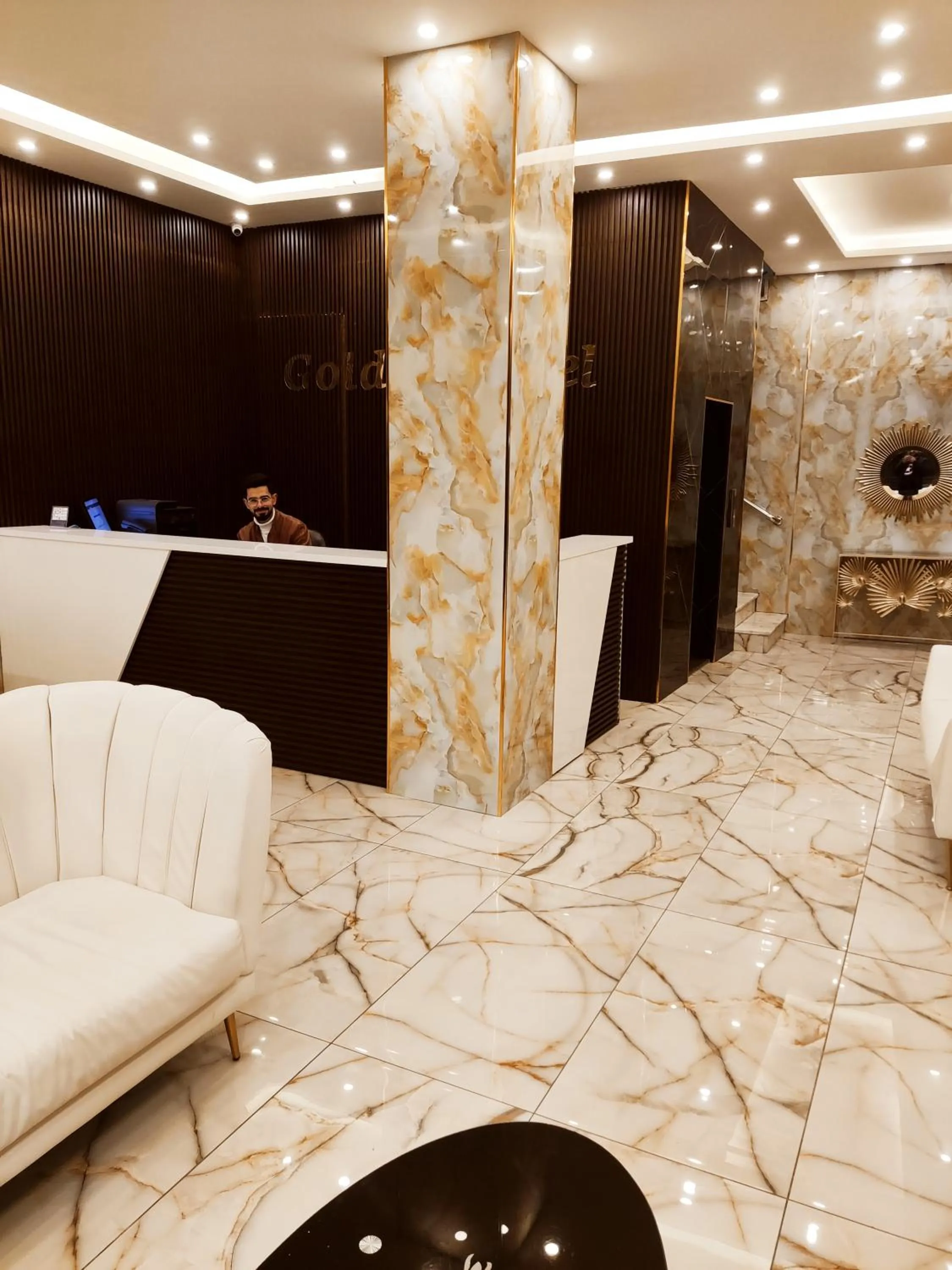 Lobby or reception in Golden Hotel