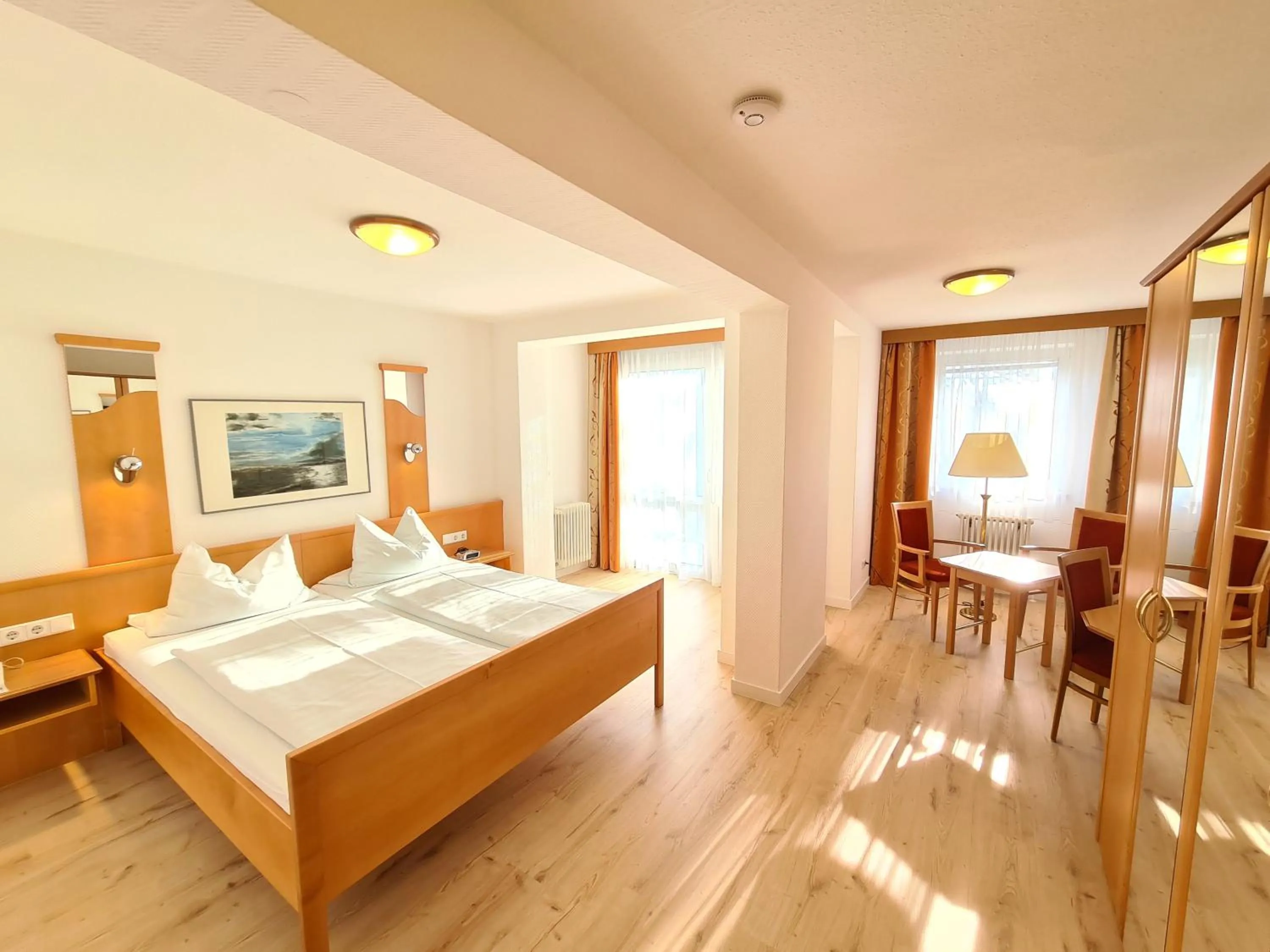 Photo of the whole room, Bed in Thermenhotel Tannenhof - Ihr Wohlfühl-Hotel