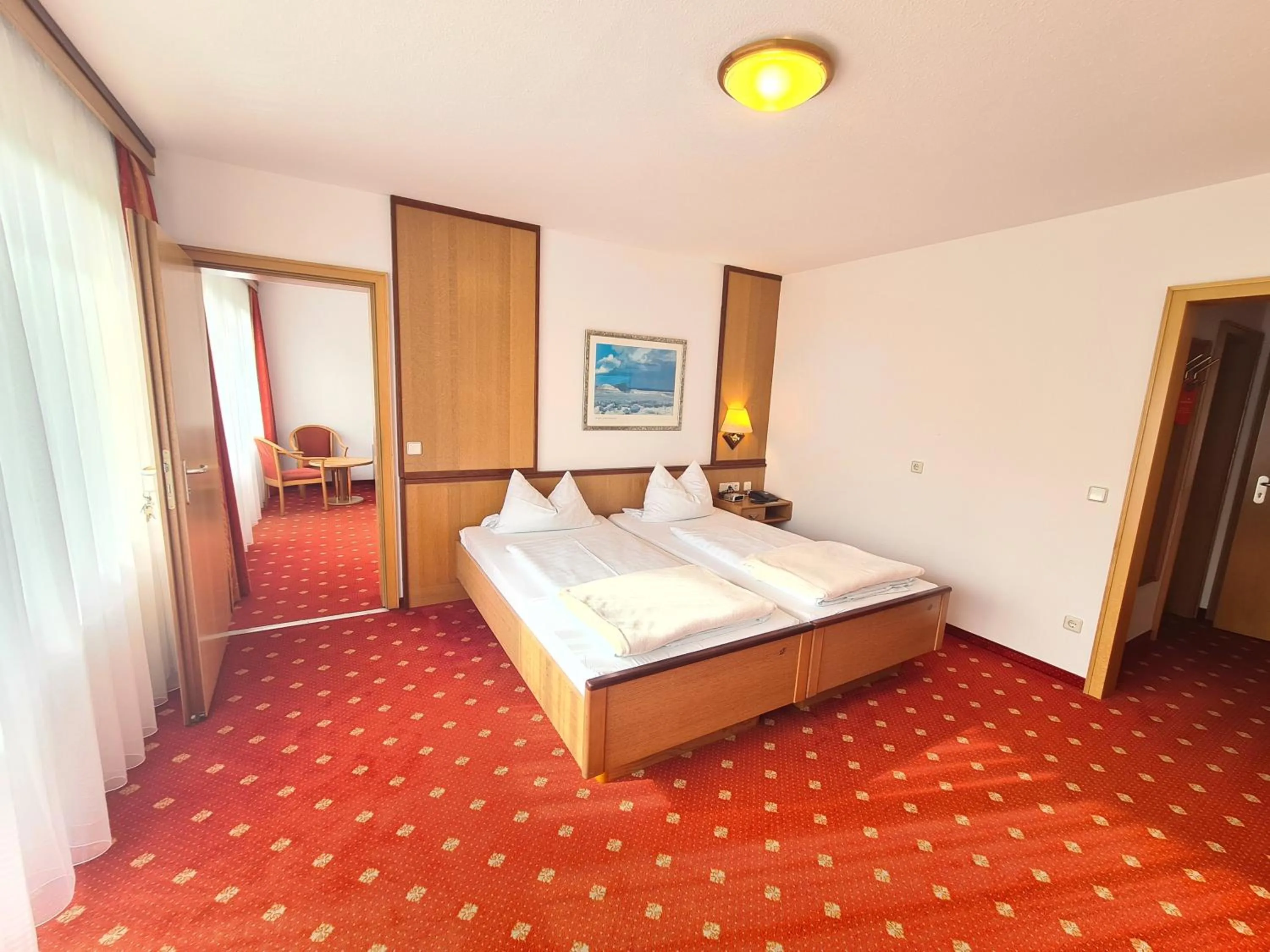 Photo of the whole room, Bed in Thermenhotel Tannenhof - Ihr Wohlfühl-Hotel