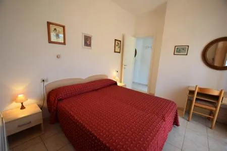 Bed in Appartamenti Villa Miramare