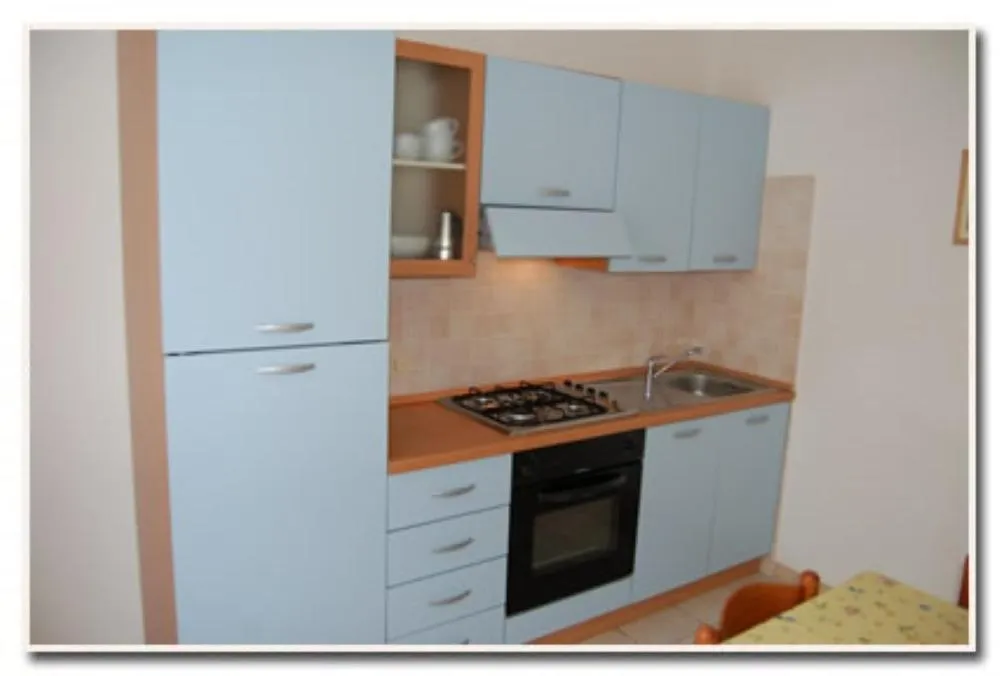 Kitchen or kitchenette in Appartamenti Villa Miramare