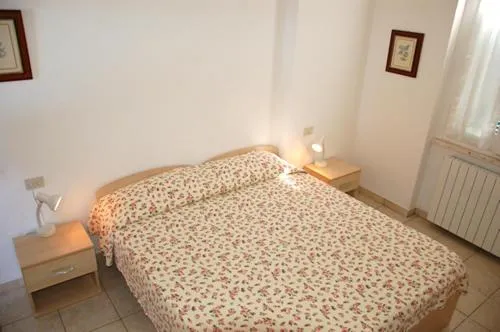 Bedroom, Bed in Appartamenti Villa Miramare