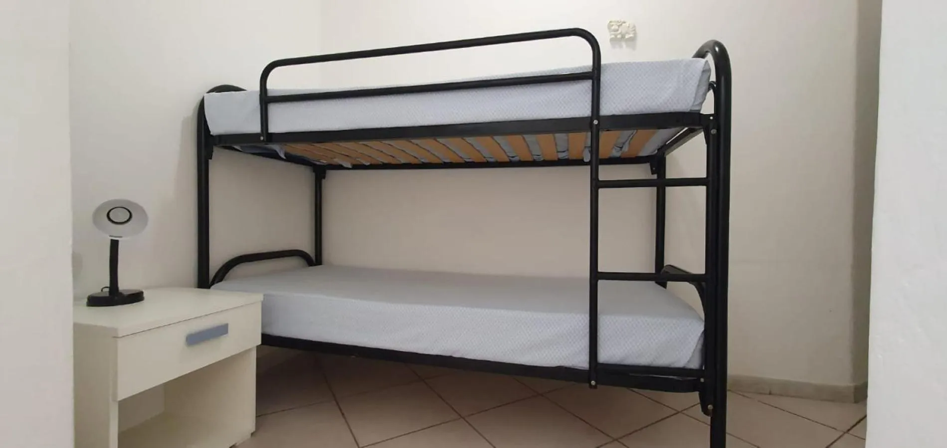 Bed in Appartamenti Villa Miramare