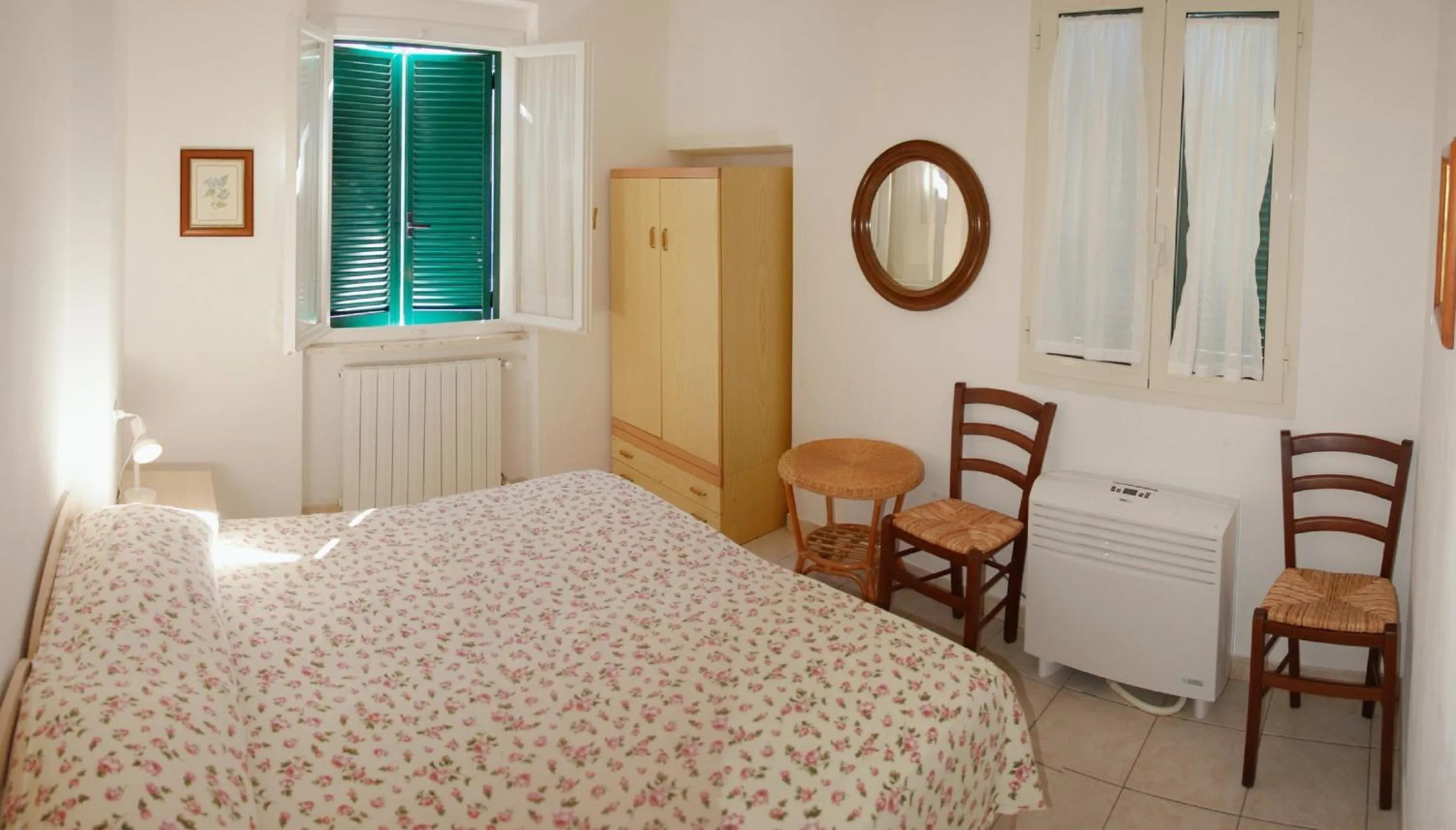 Bedroom, Bed in Appartamenti Villa Miramare