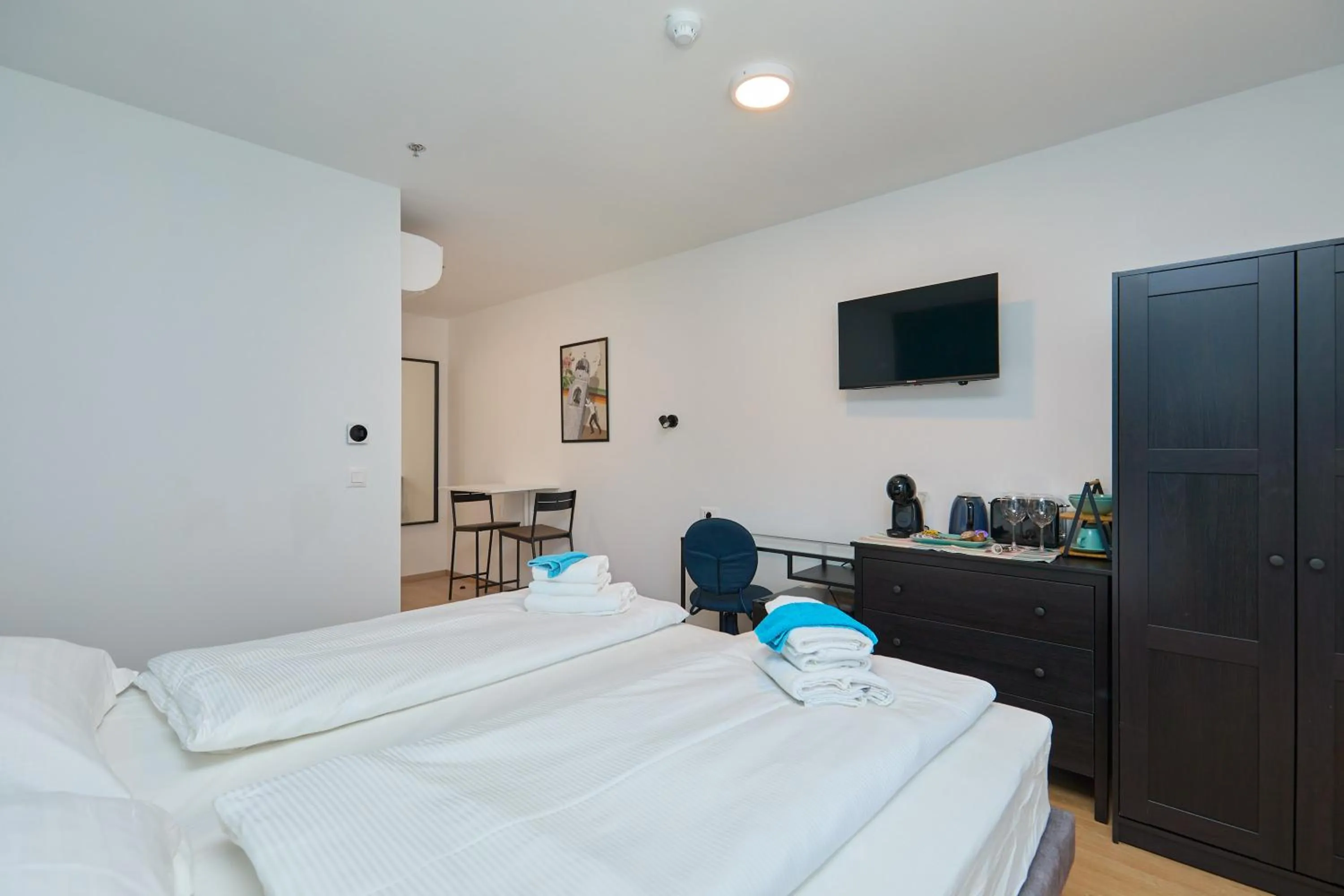 Bed in DOMINIUM CITY SUITES