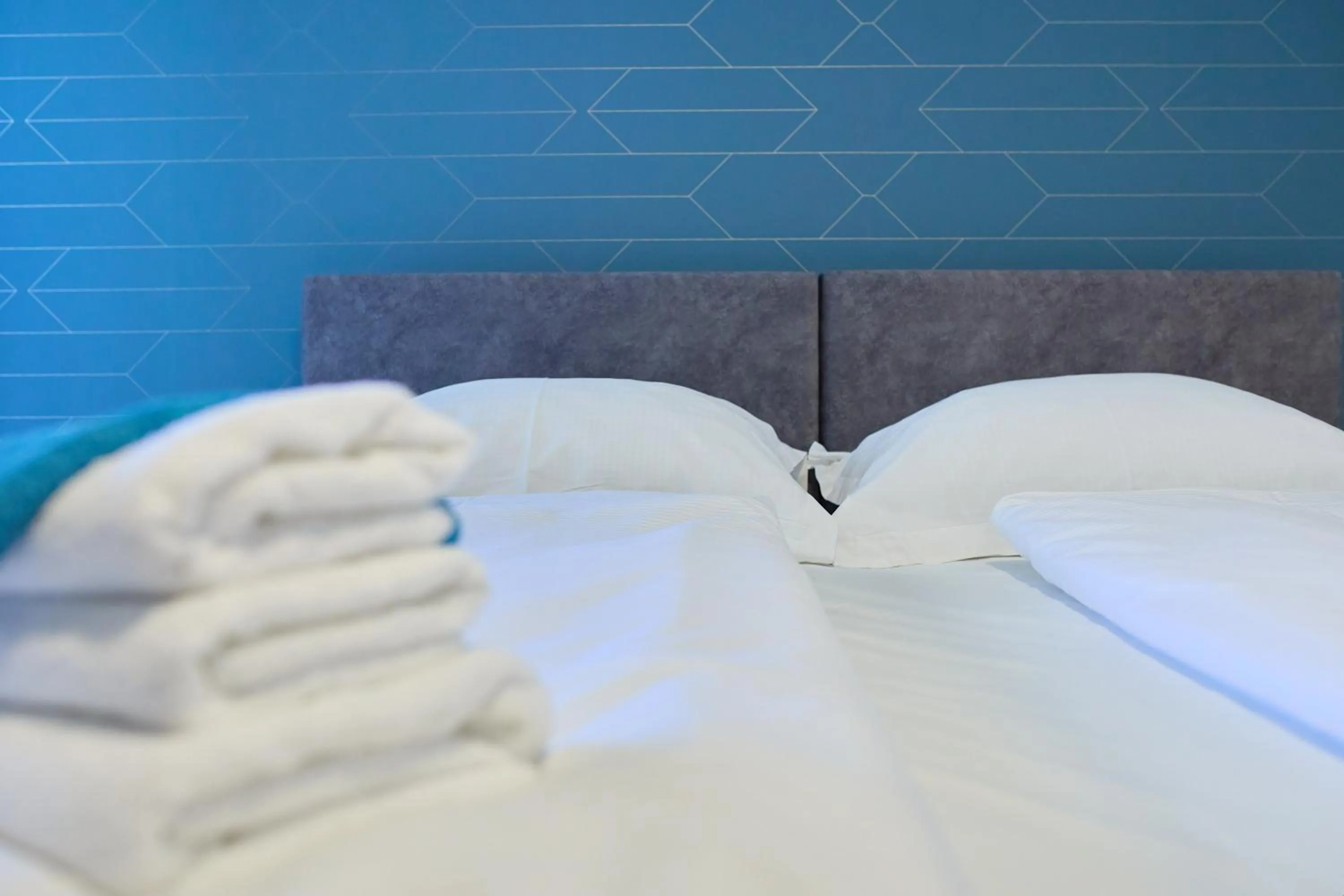 Bed in DOMINIUM CITY SUITES