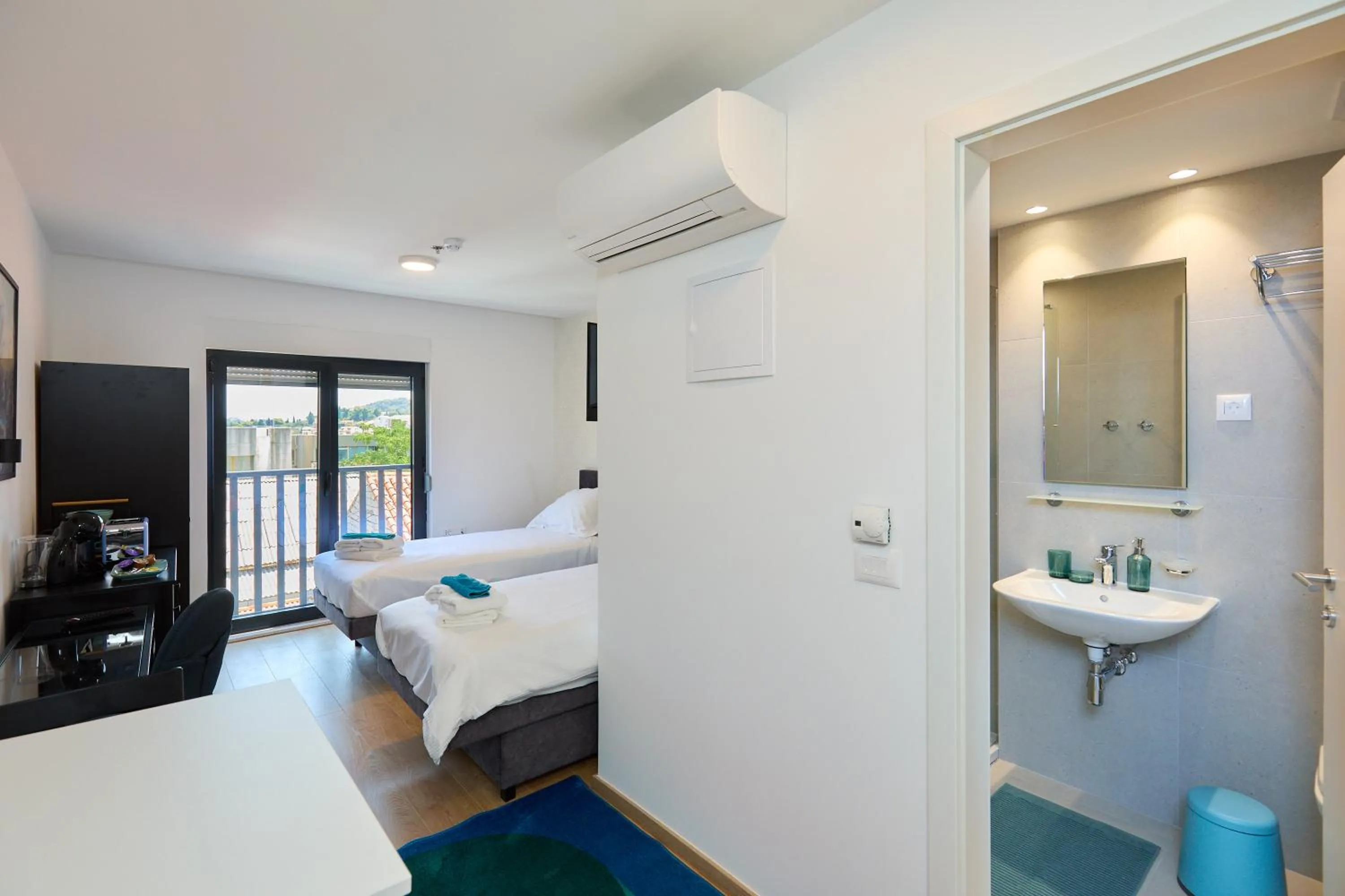 Bed in DOMINIUM CITY SUITES