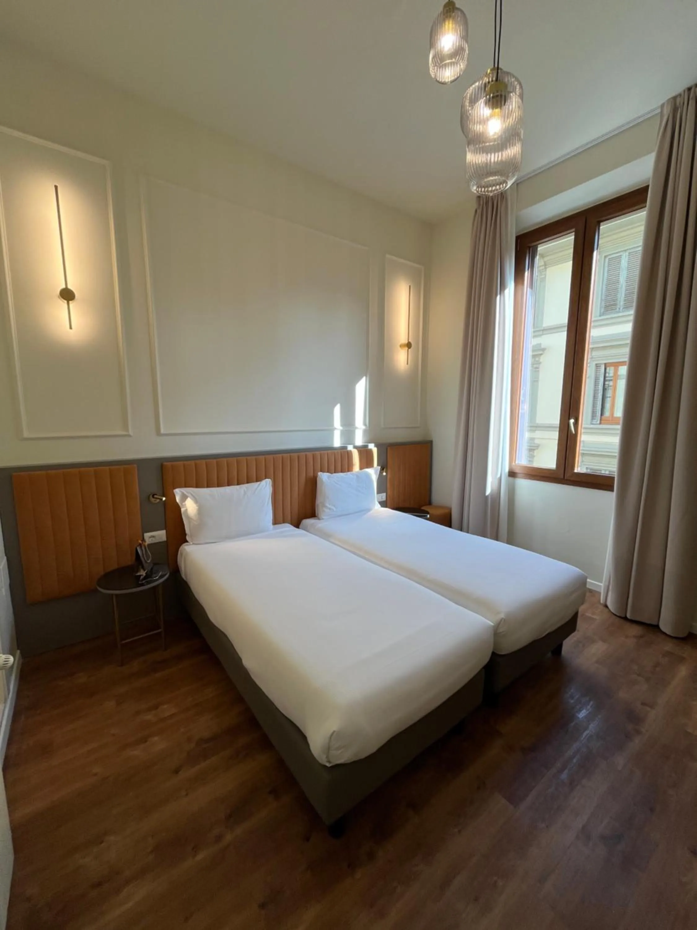 Bed in Hotel Duca D'Aosta