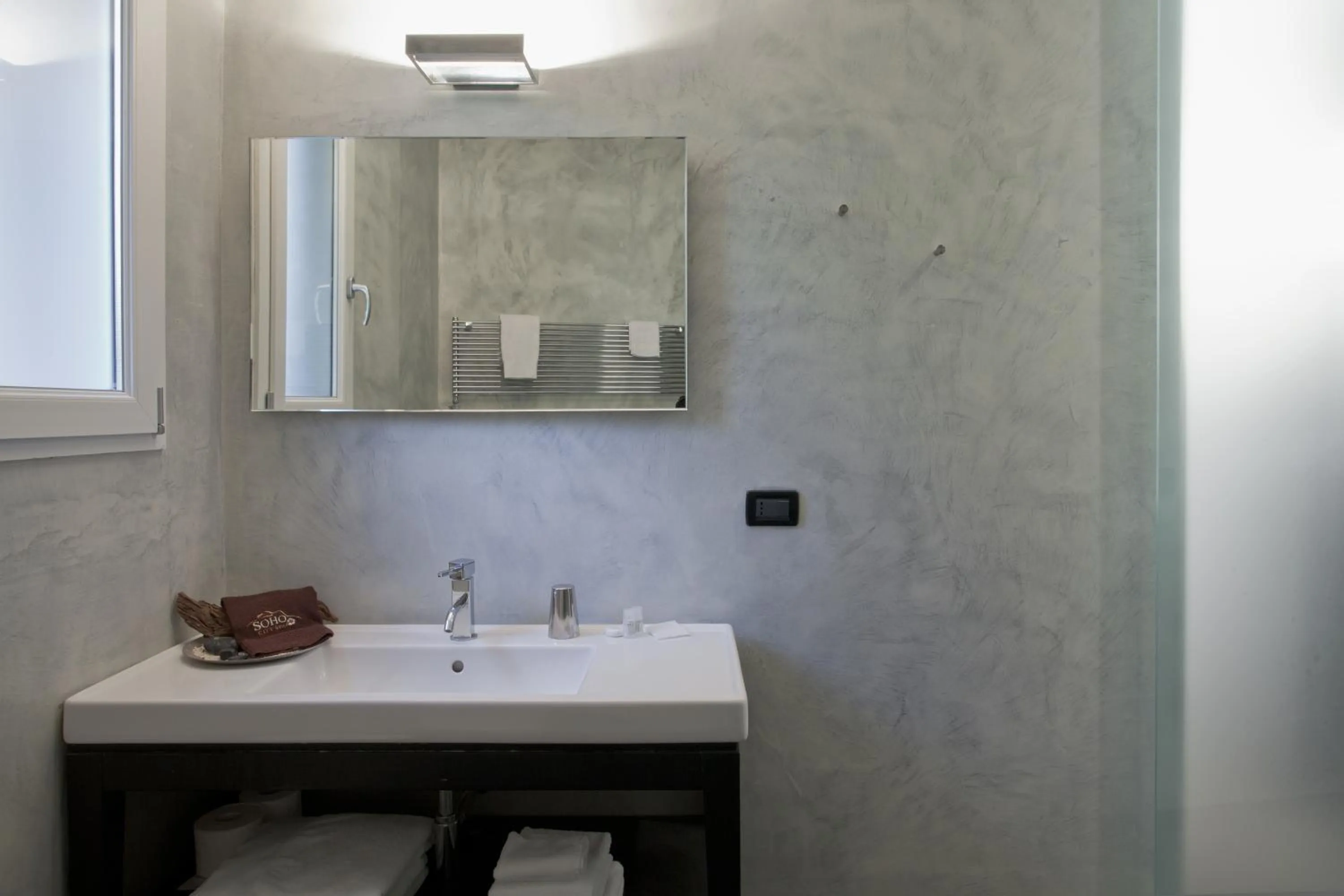 Bathroom in MA Hotel