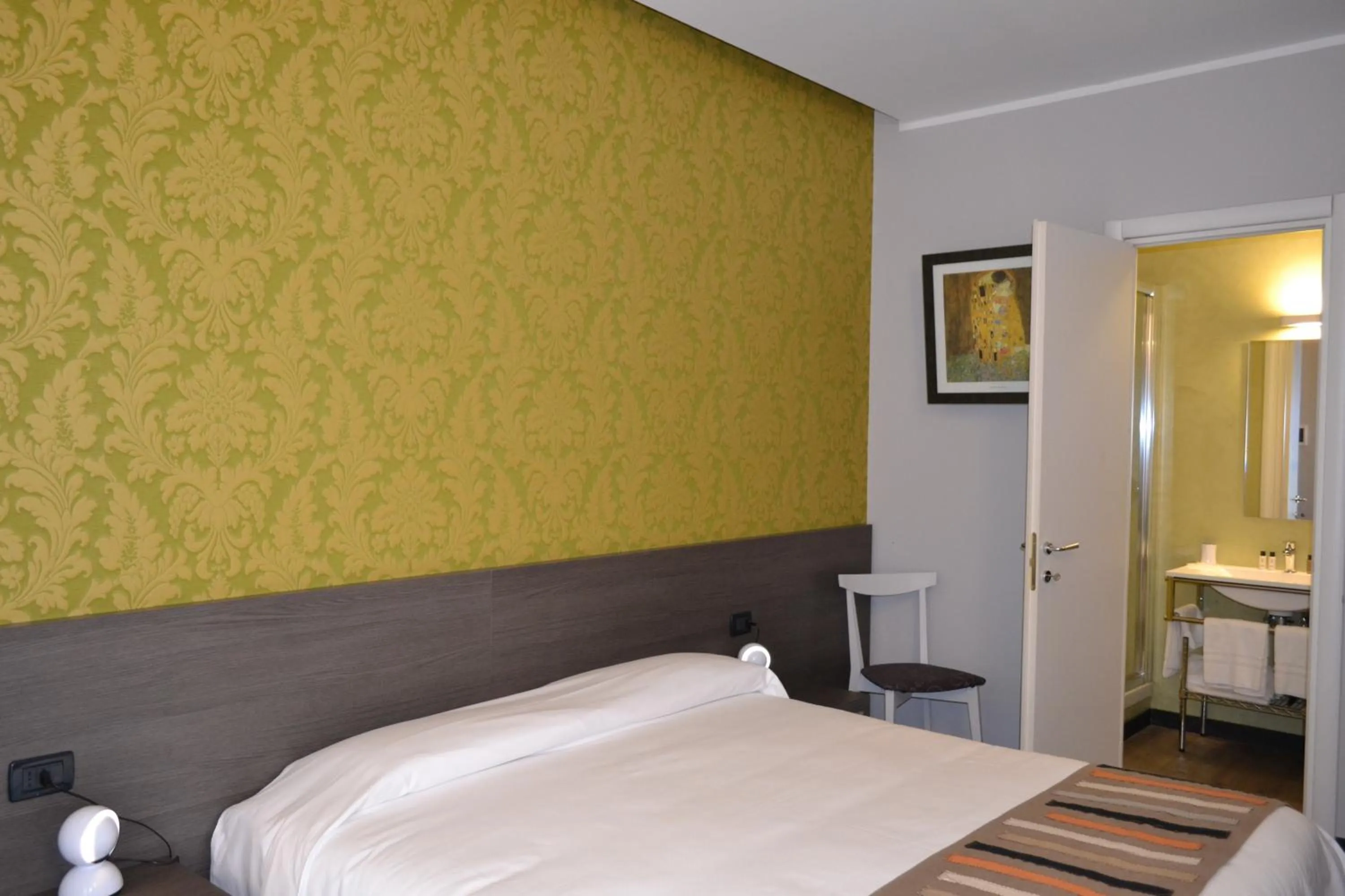 Photo of the whole room, Bed in MA Hotel