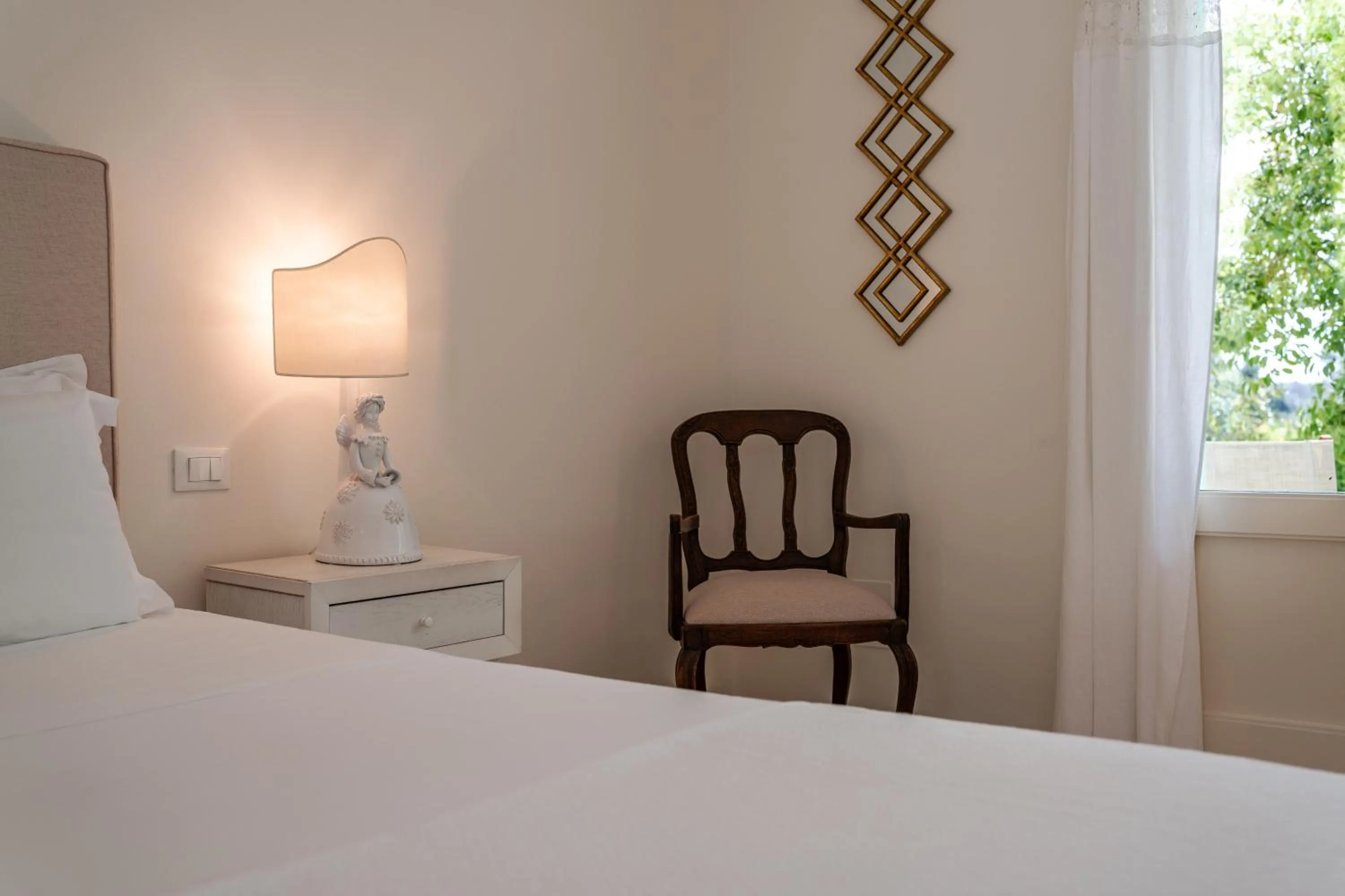 Decorative detail, Bed in Tenuta Centoporte