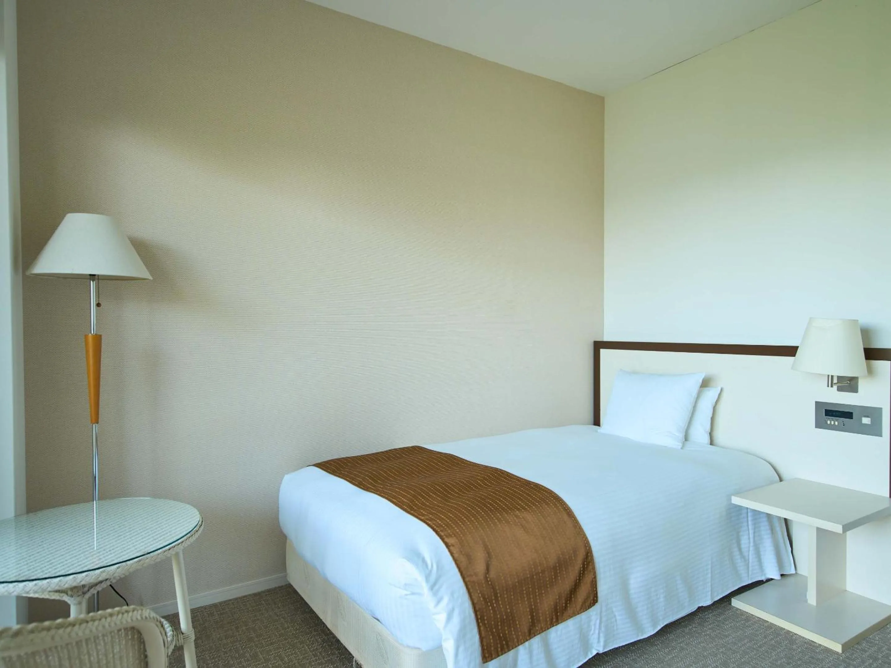 Bed in Hotel Holistic Resort Wakayama