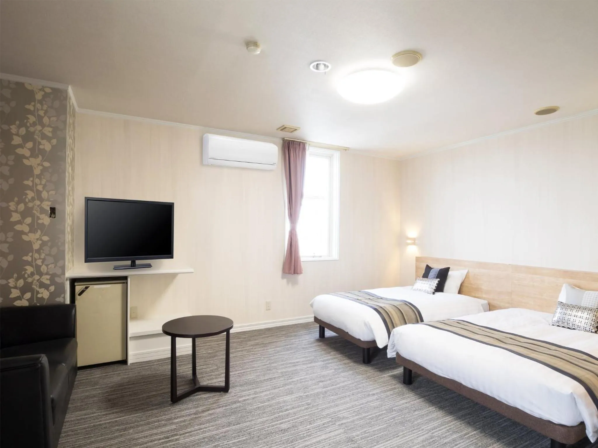 Photo of the whole room, Bed in Hotel AreaOne Obihiro