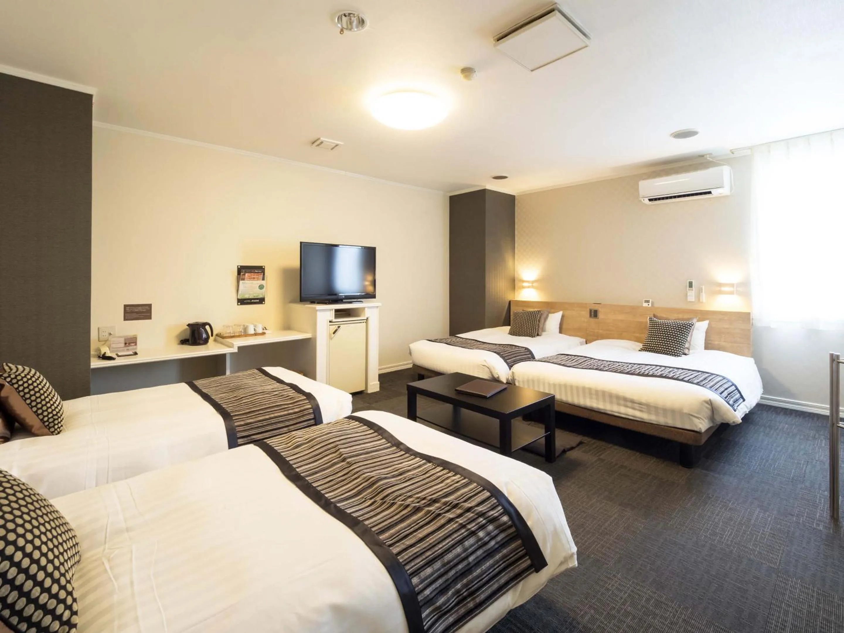 Photo of the whole room, Bed in Hotel AreaOne Obihiro