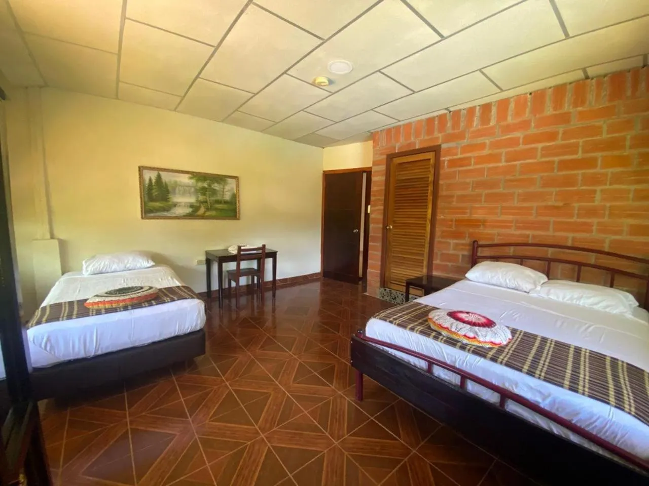 Bed in Grand Selva Lodge & Tours