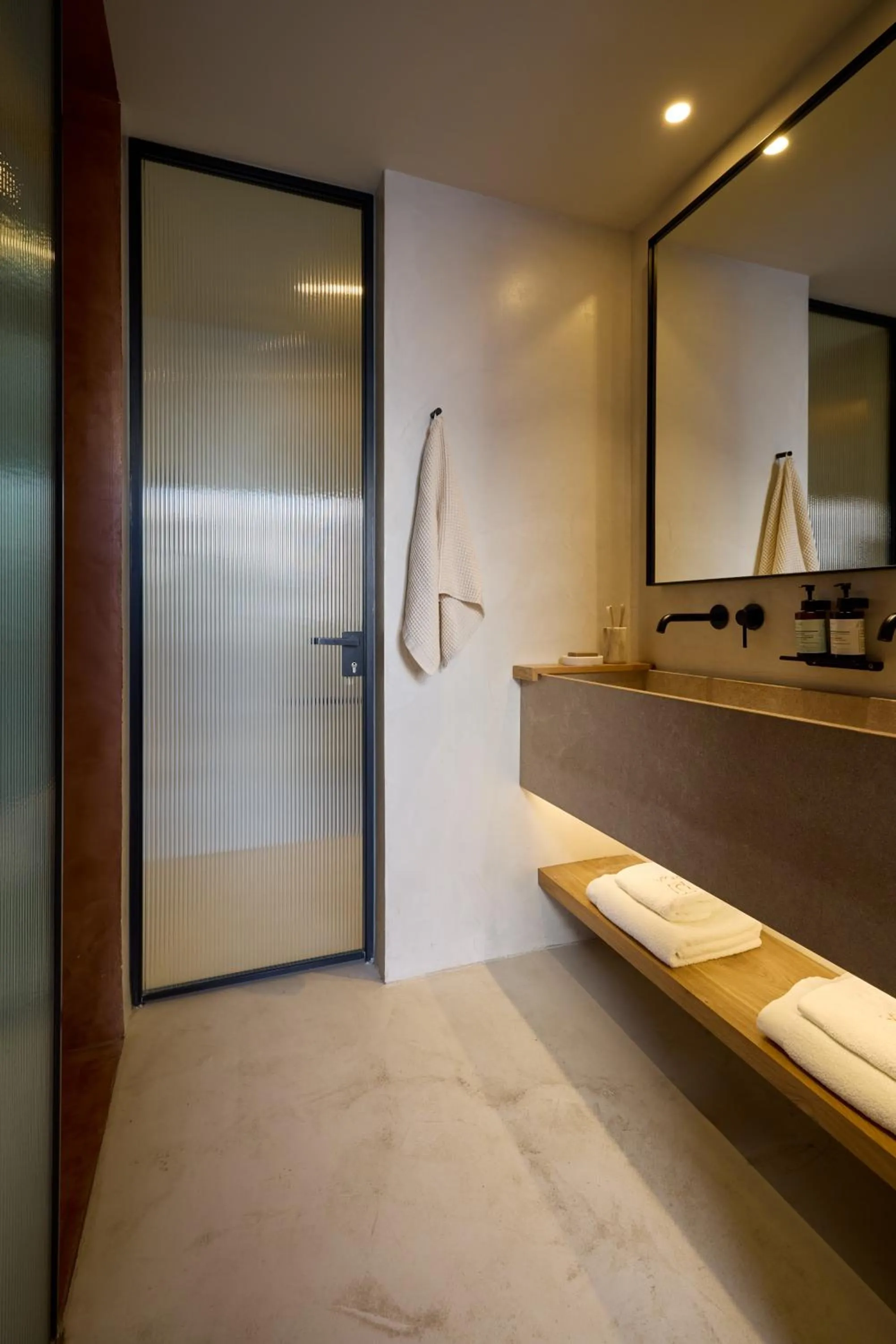 Bathroom in KOIA All - Suite Well Being Resort - Adults Only
