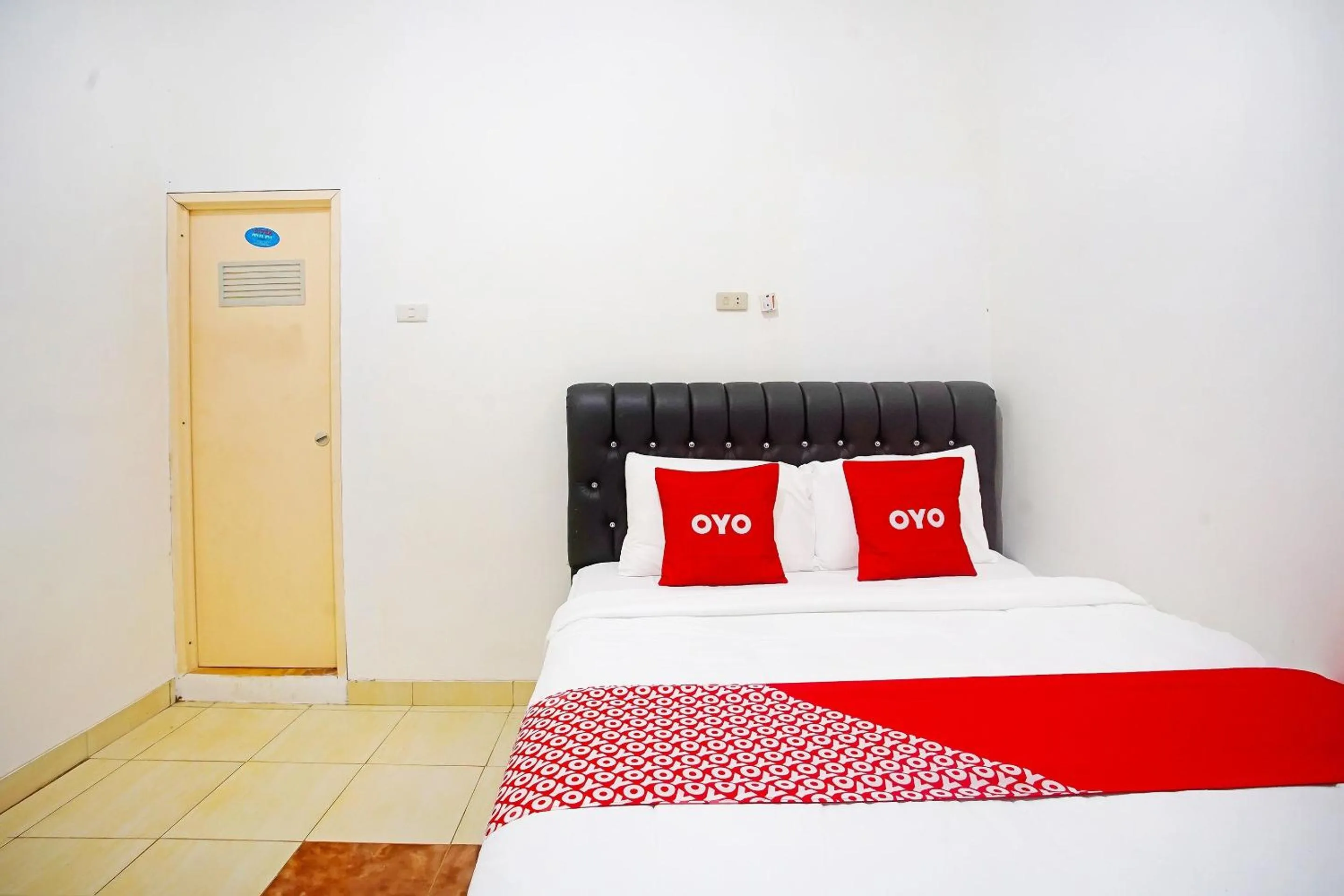 Bedroom in OYO 91460 Guest House Kencana Syariah